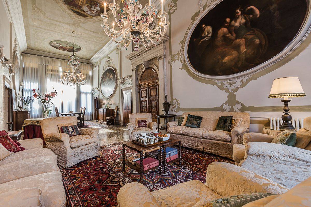 the living room features authentic 17th paintings from Paolo Pagani