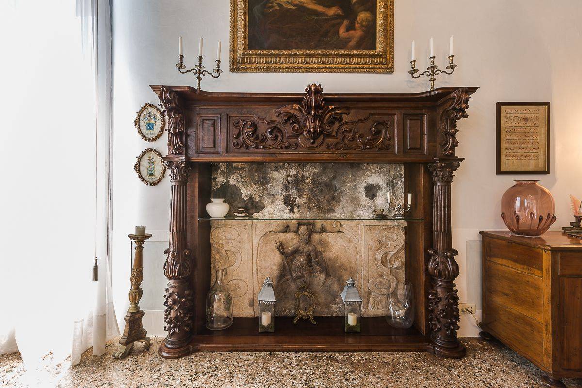 the fireplace of the library withnesses the history of this property