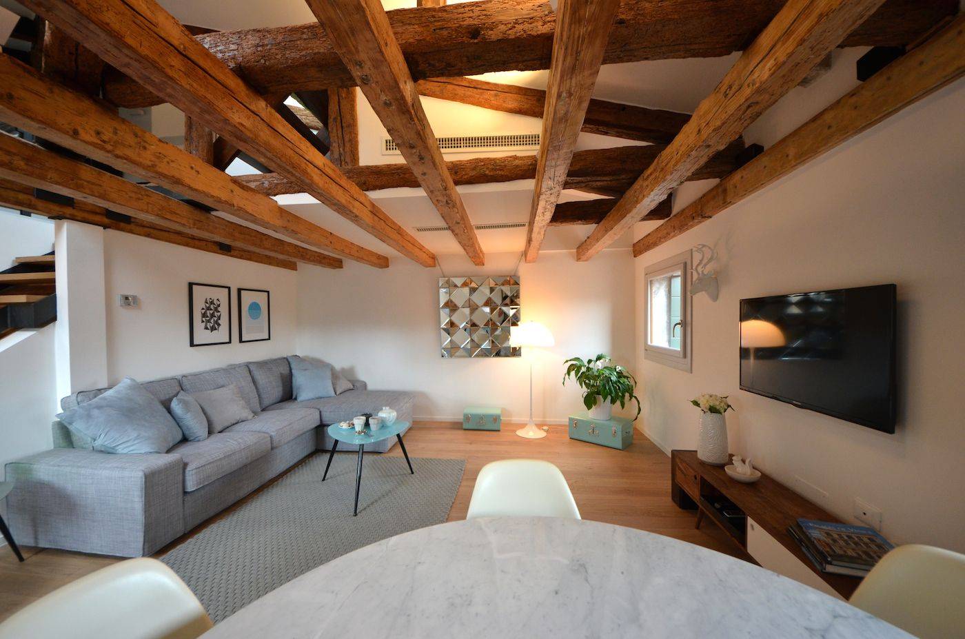 the cozy living room of the Sagredo apartment