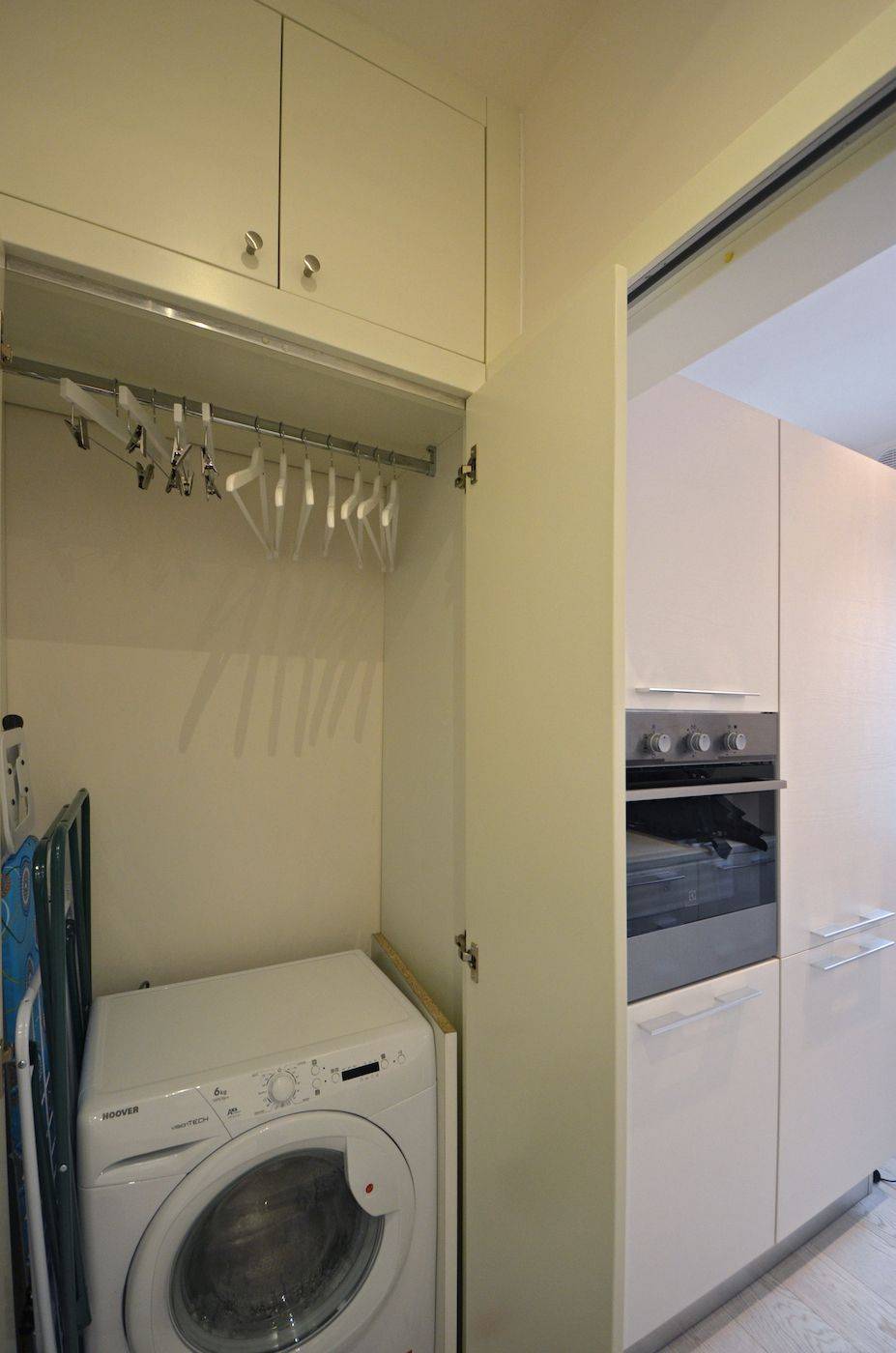 next to the kitchen can be found a closet for coats and washing machine