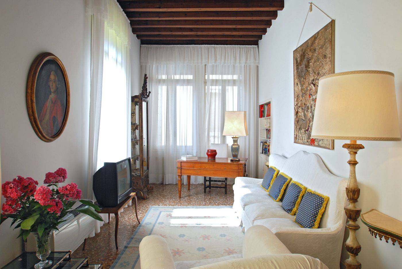 the comfortable TV area with library and office corner the comfortable TV area with library and office corner