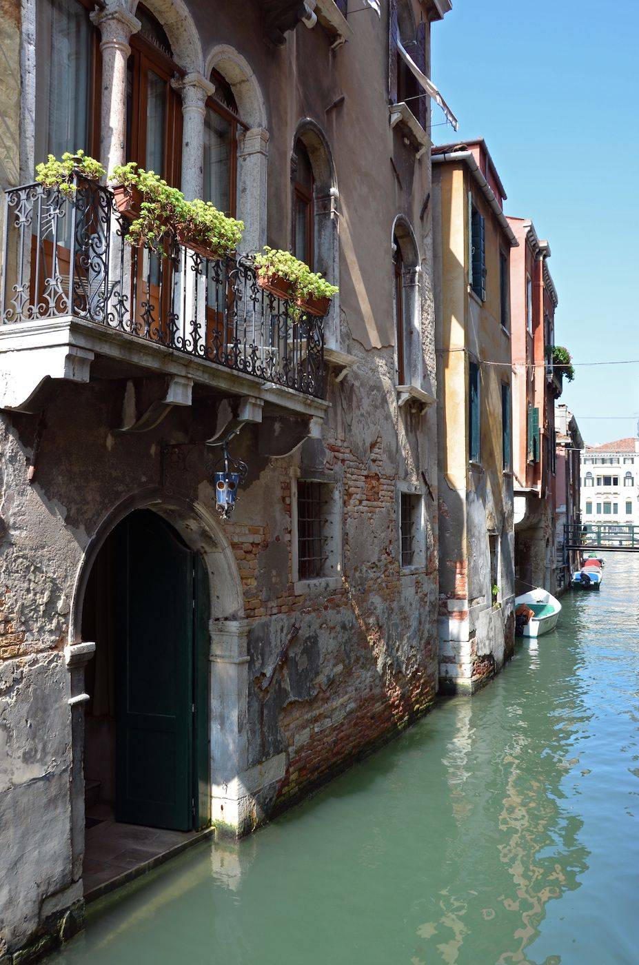 the Ca Pesaro Suite is located next to a charming canal