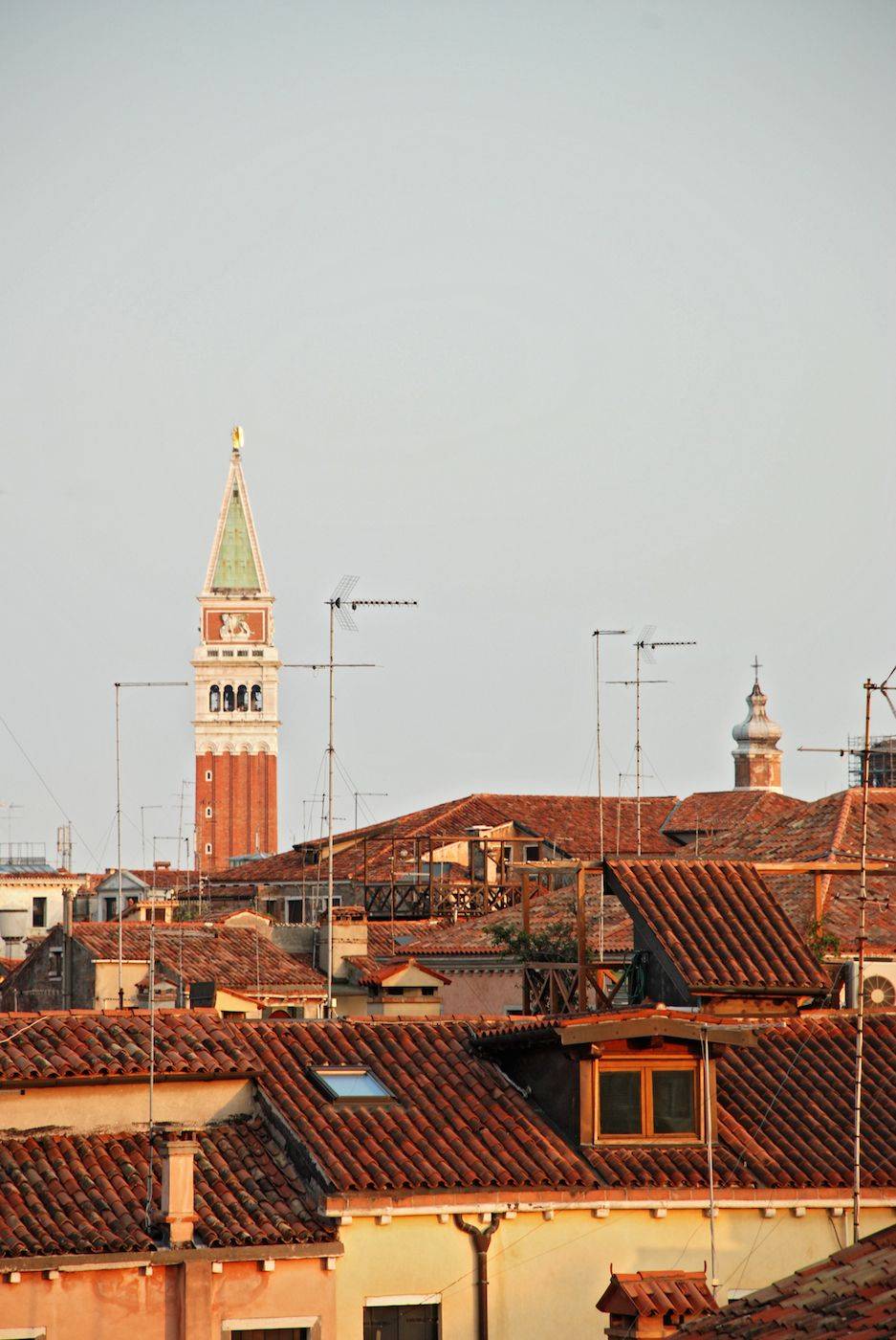 the view from the attic bedroom on the roof-tops of the historical center