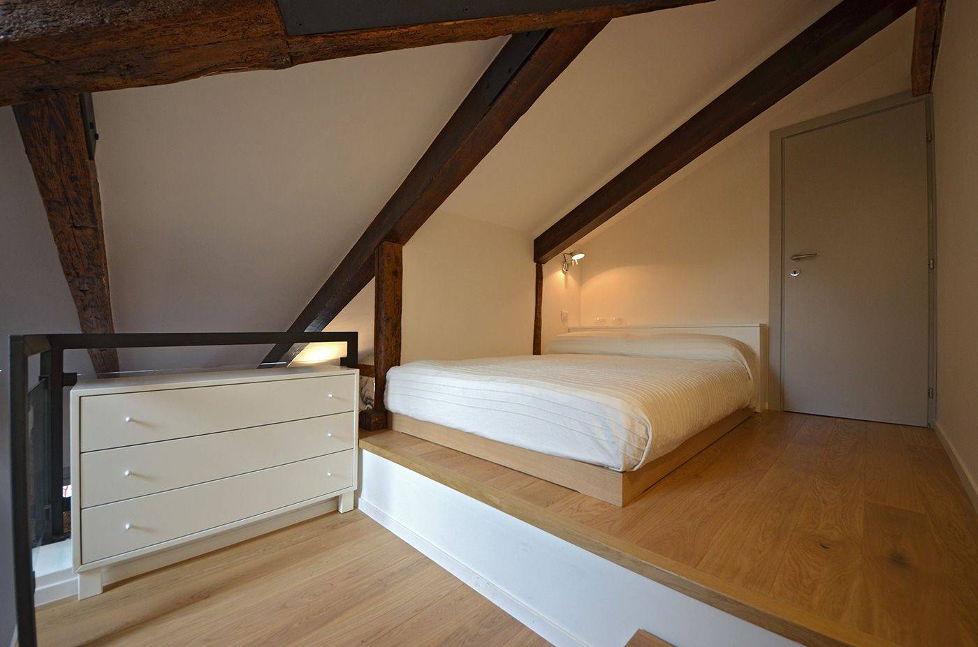 in the attic level there is a 140 cm wide bed 