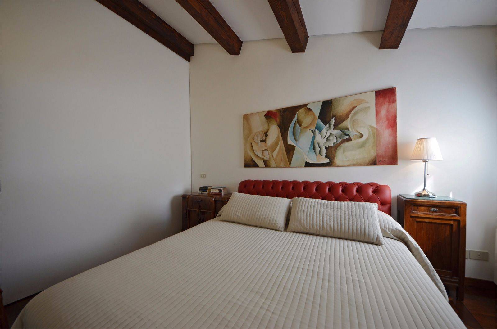 a sliding wall divides the second bedroom from the living room