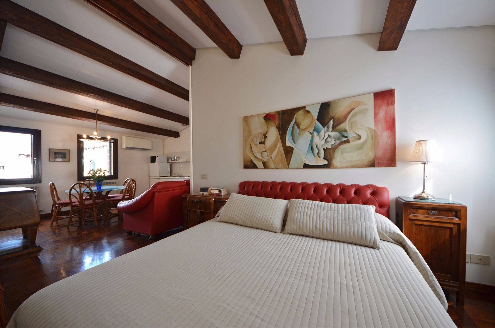 a sliding wall divides the second bedroom from the living room