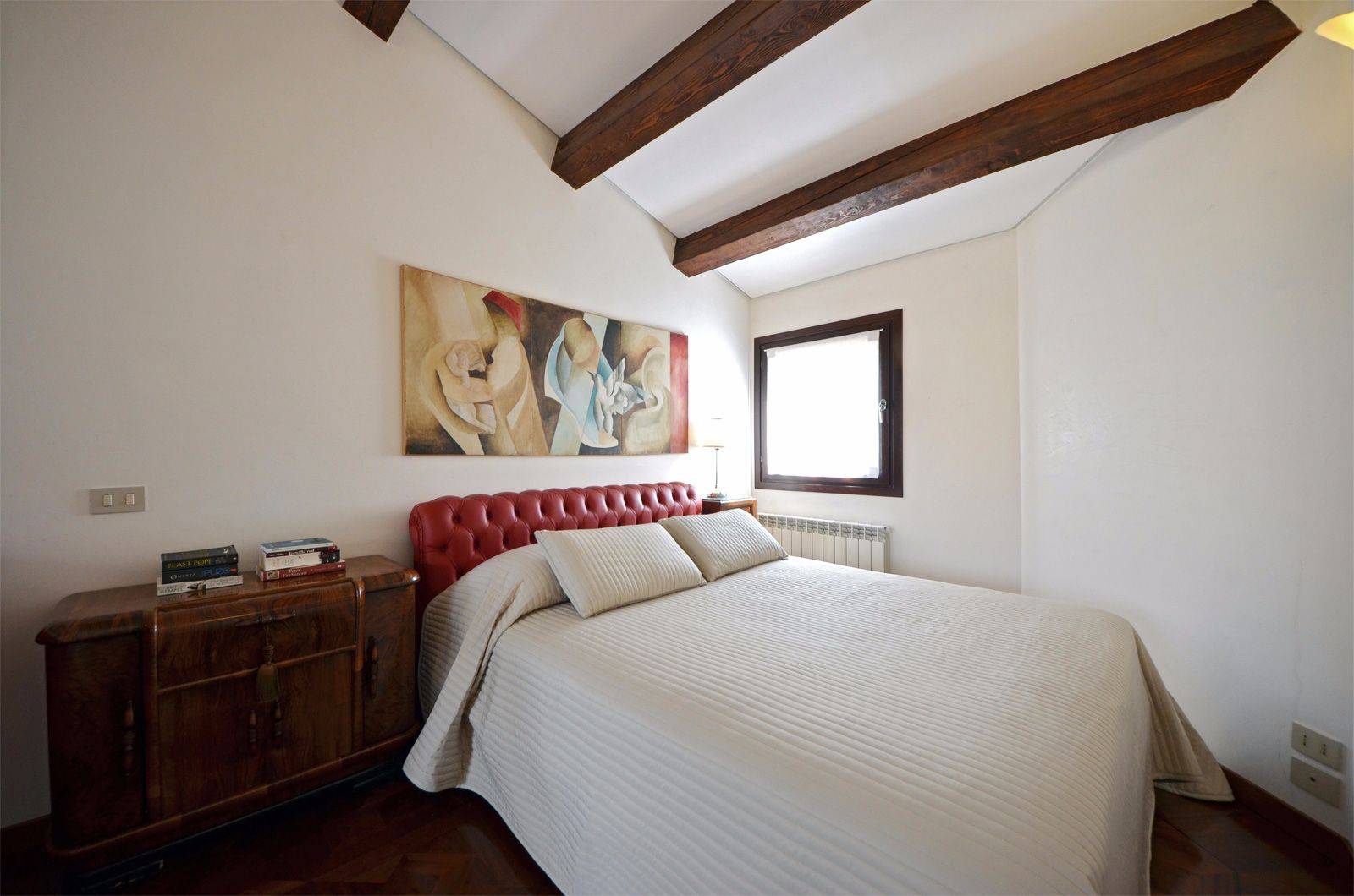 cozy second bedroom with comfortable king size bed