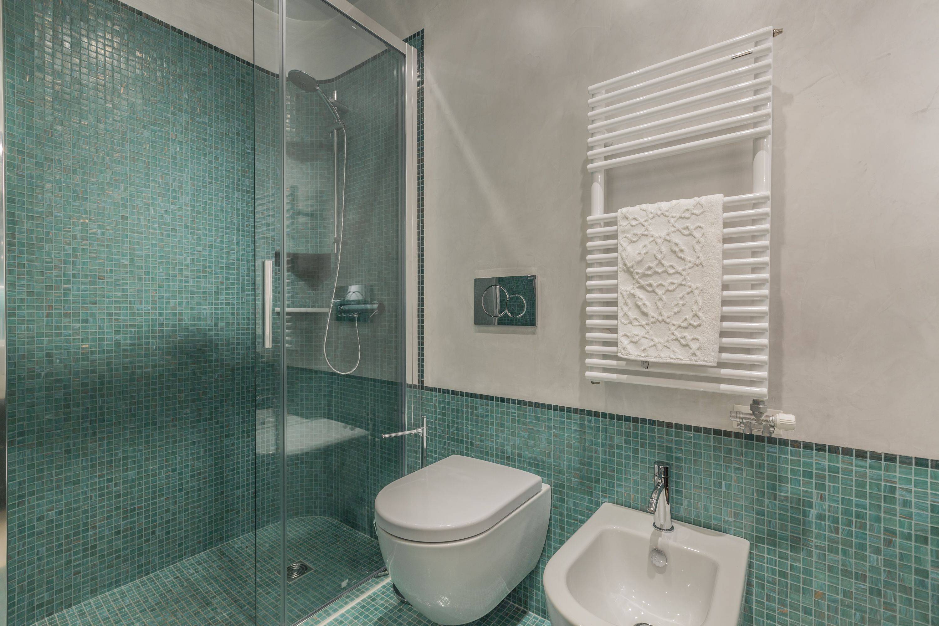 the second bathroom has a large shower box the second bathroom has a large shower box