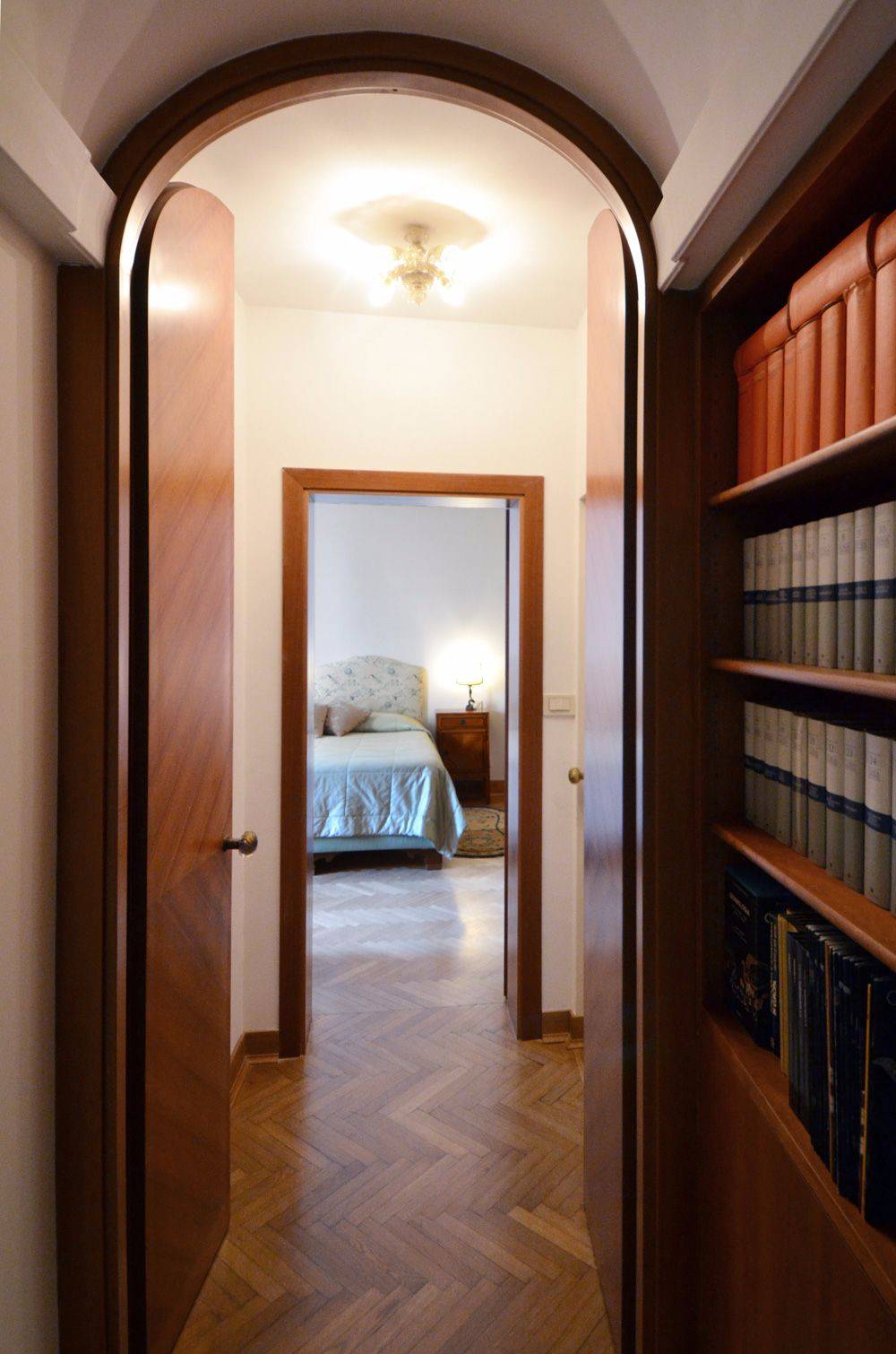 corridor with library leading to the bedrooms