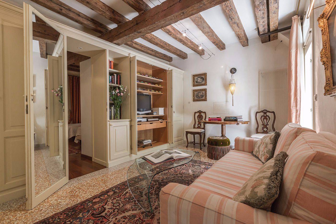 in the living room there is the passage to the double/twin bedroom