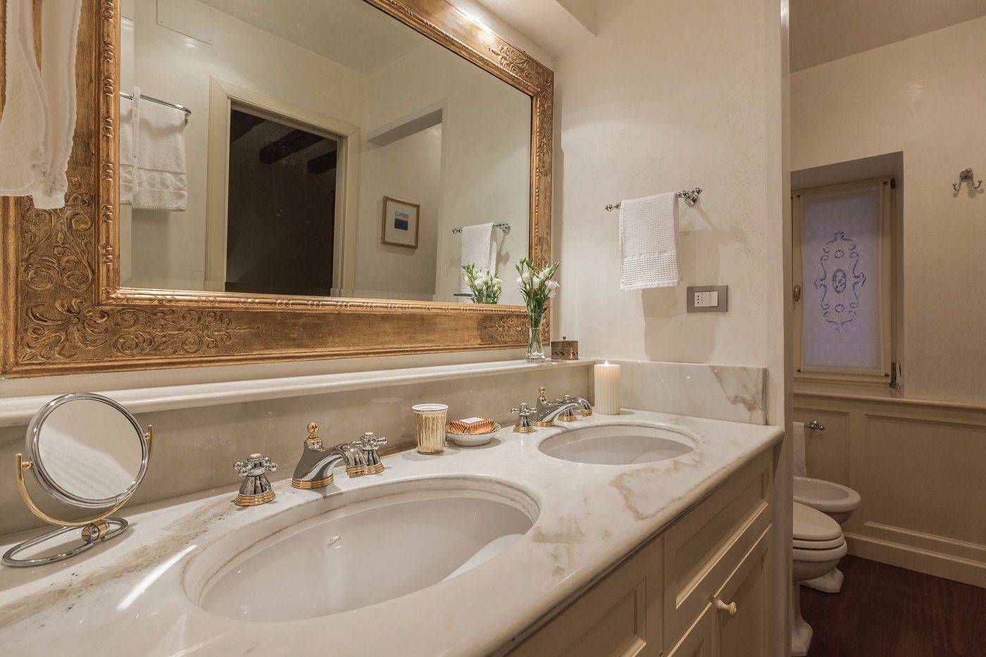 en-suite bathroom of the seconf bedroom with marble top and beautiful shower cabin