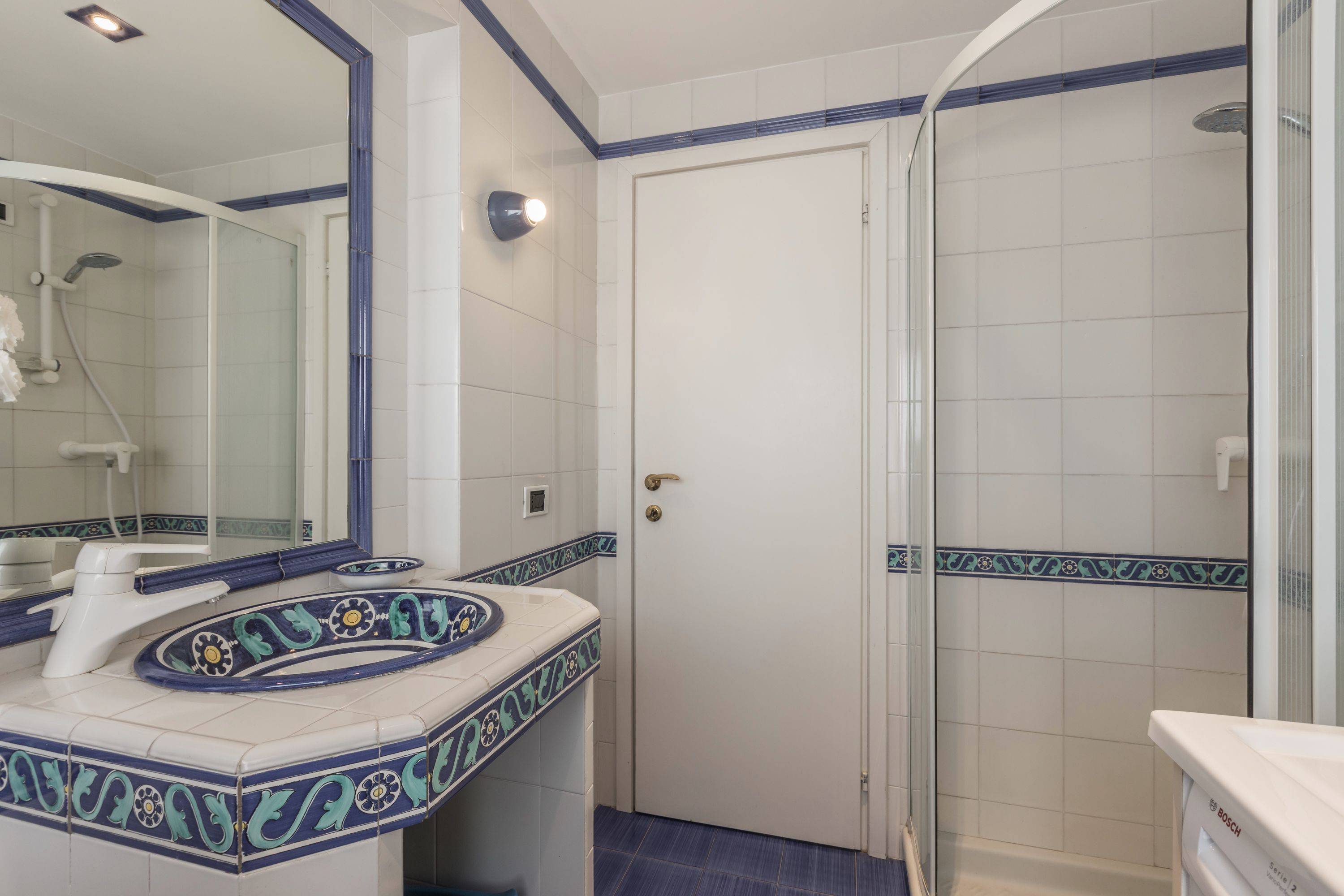 third bathroom with shower and washing machine third bathroom with shower and washing machine