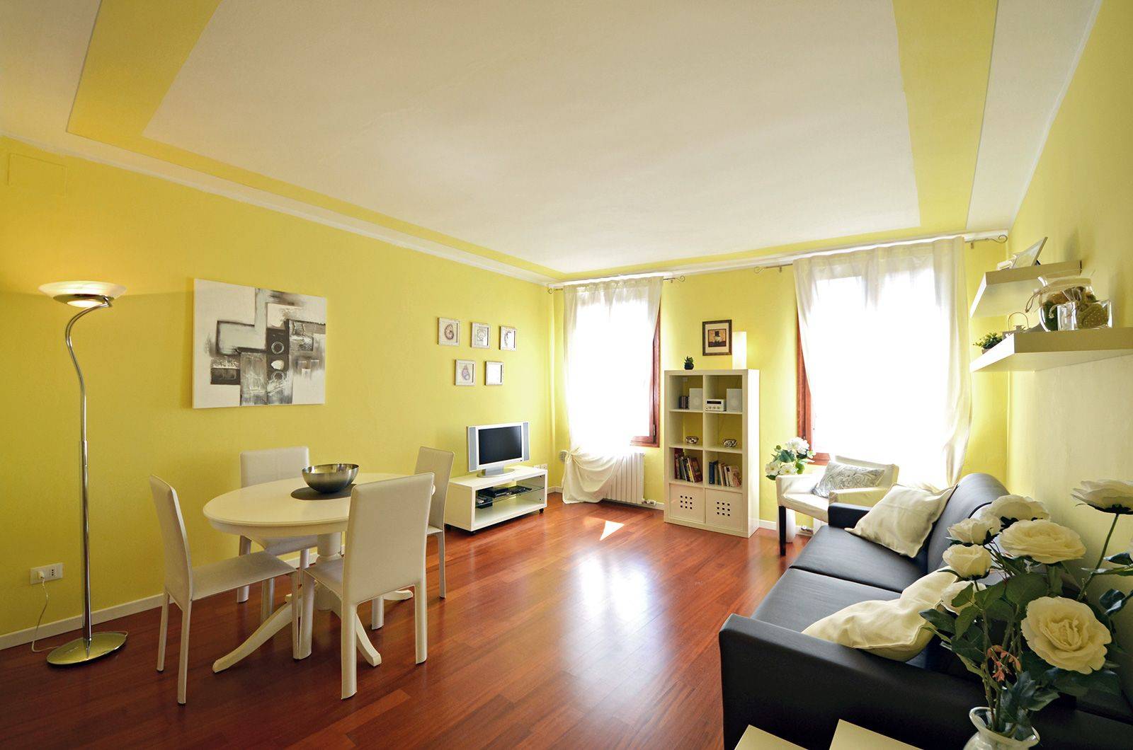 living room with windows closed and curtains