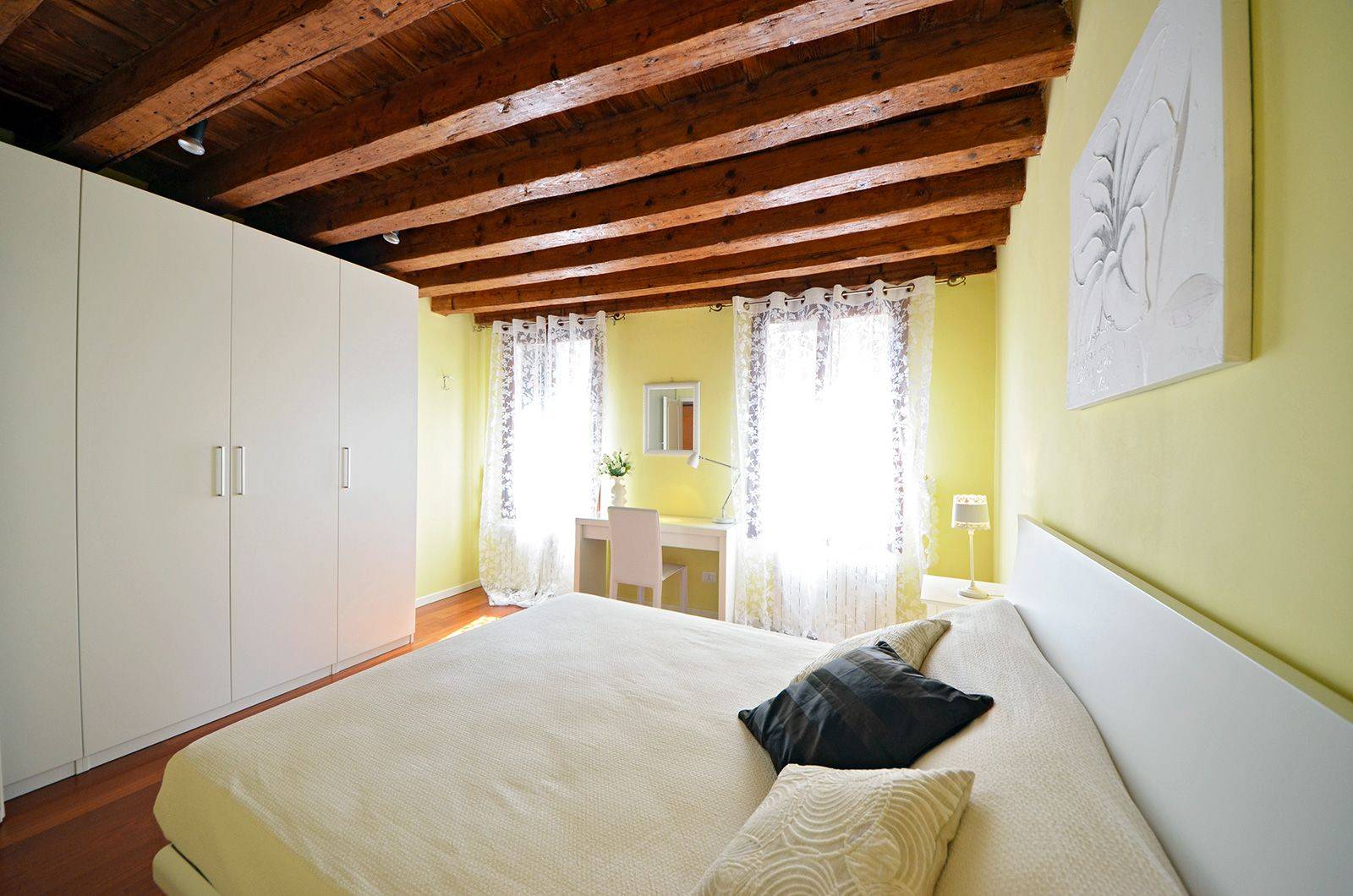 bright and spacious double bedroom with canal view