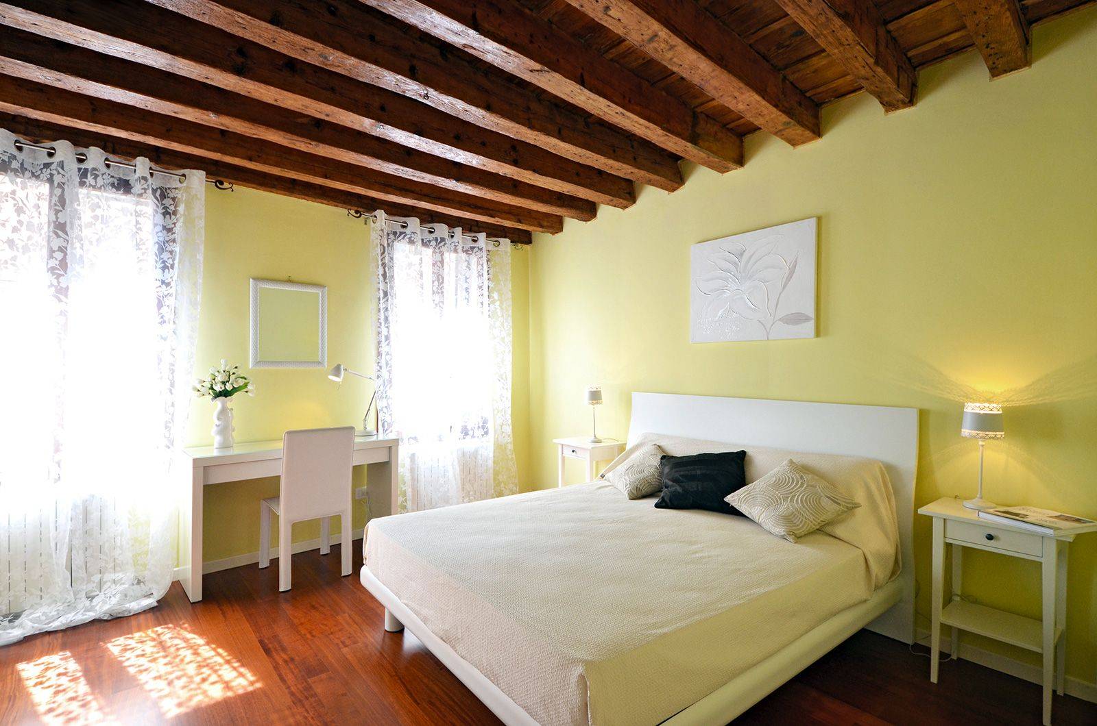 bright and spacious double bedroom with canal view