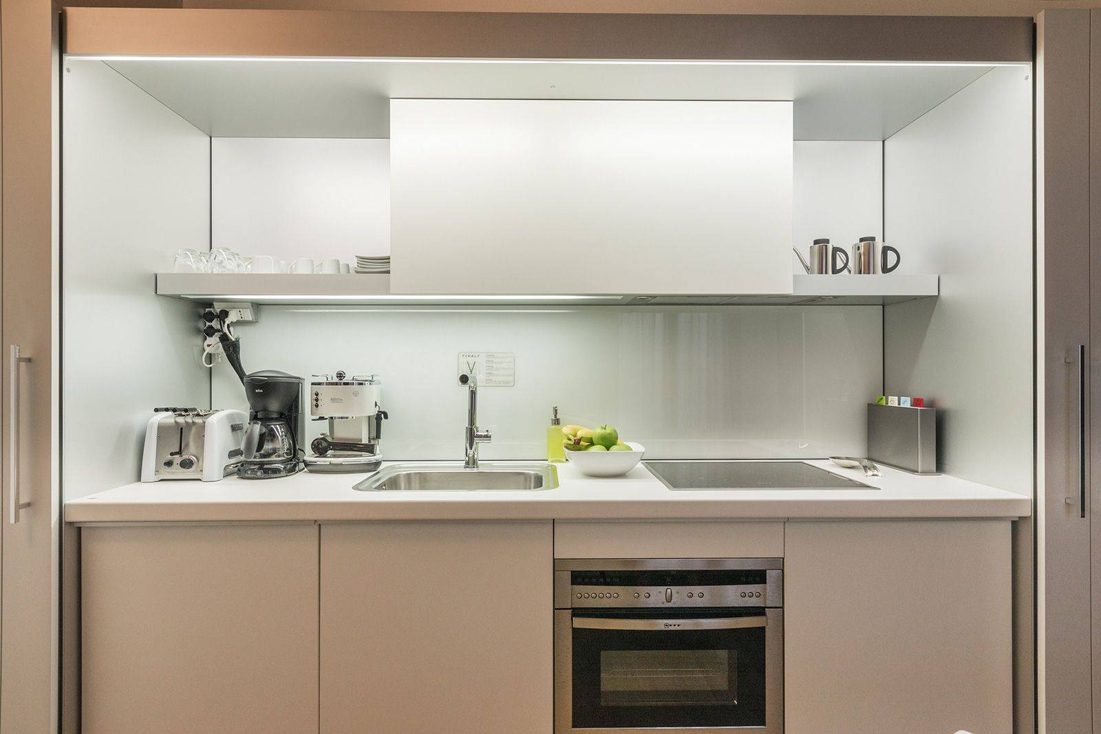 the kitchen is equipped with many useful appliances