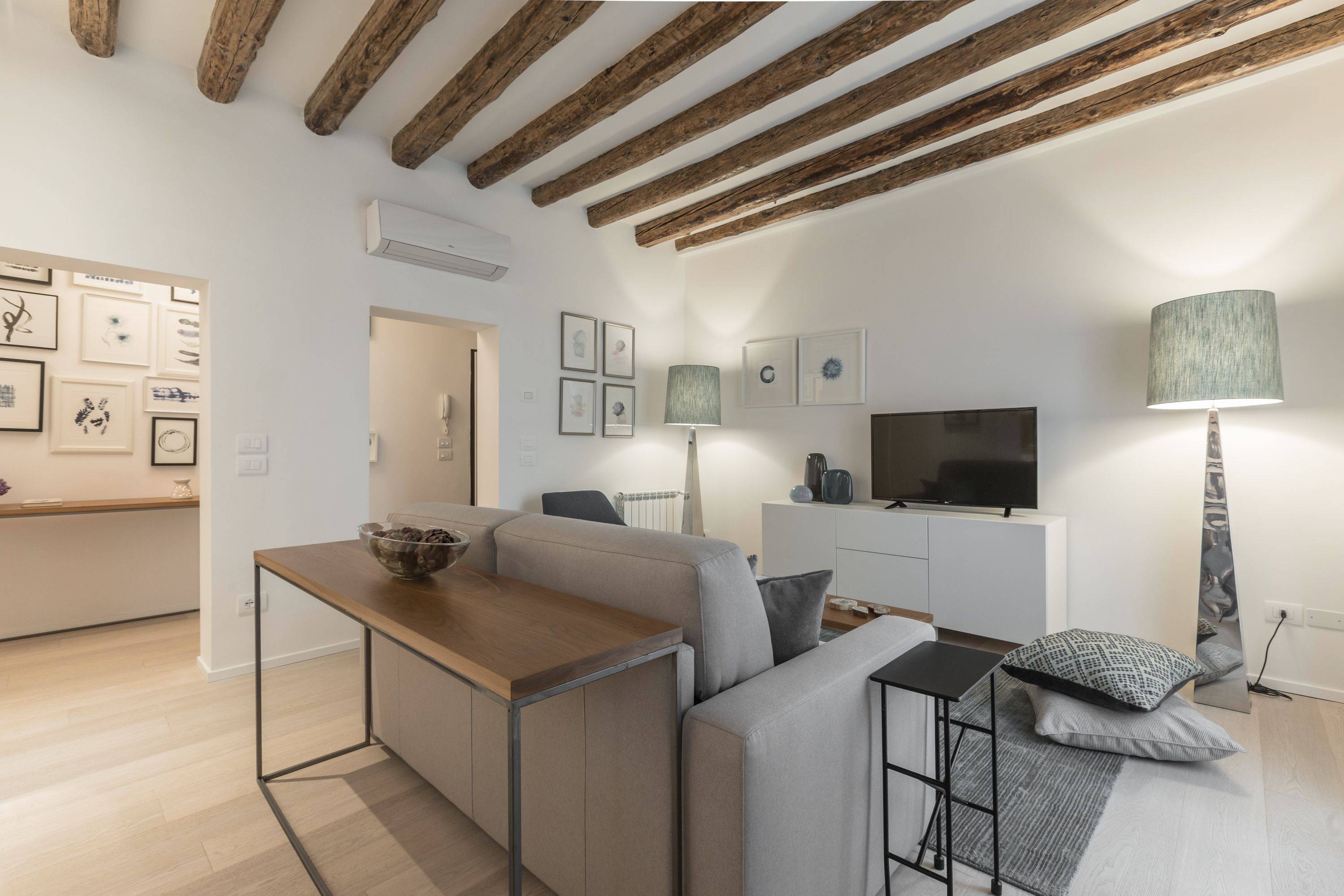 in the living room there is a comfortable sofa-bed