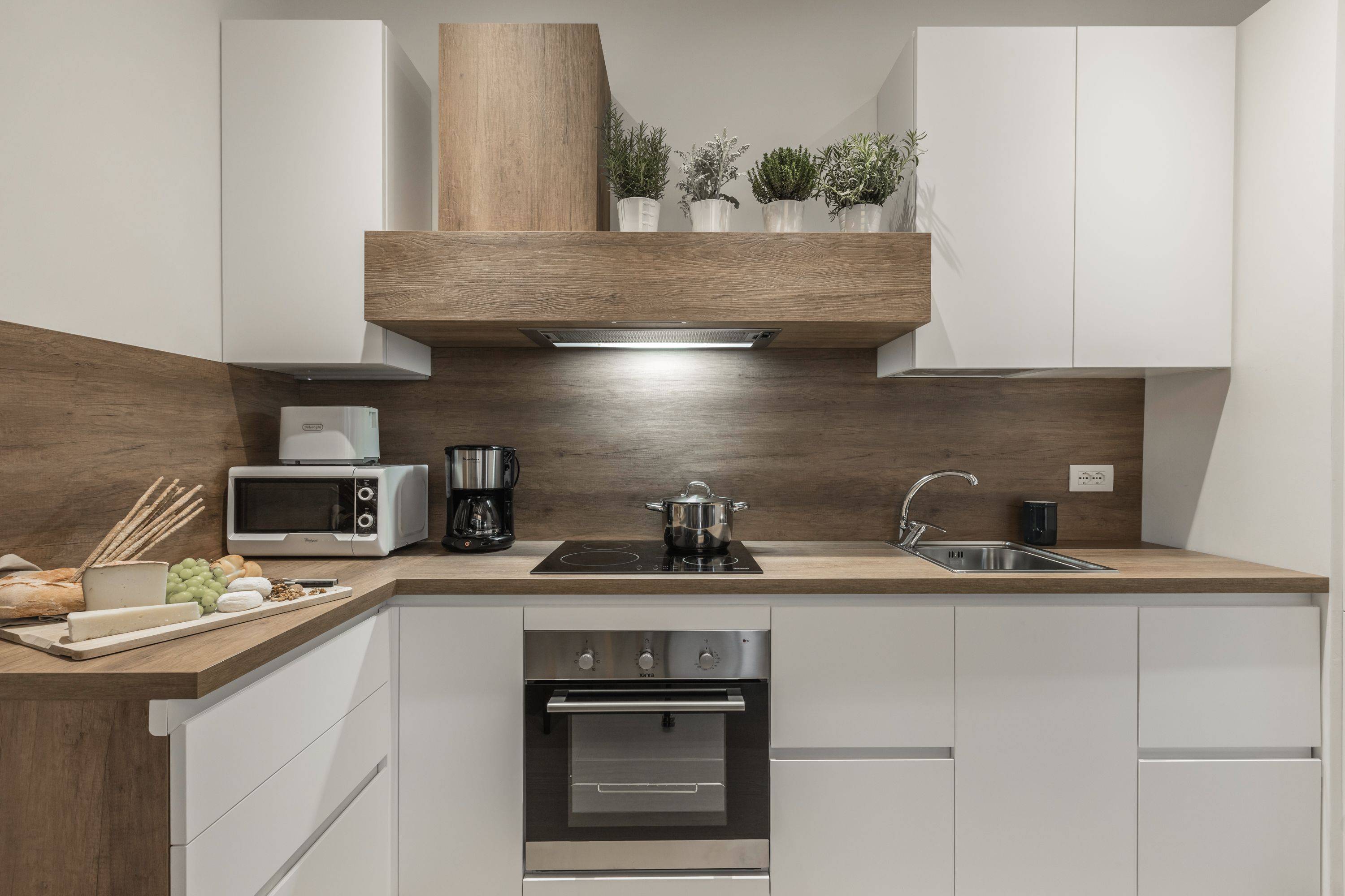 brand new designer kitchen with every sort of electrical appliance 