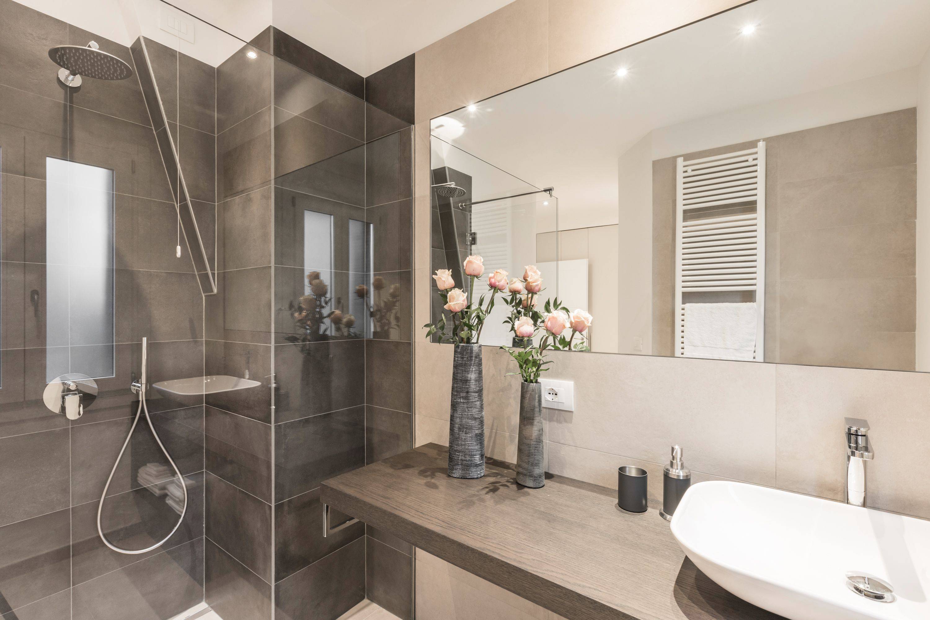 the main bathroom is large, stylish and bright...