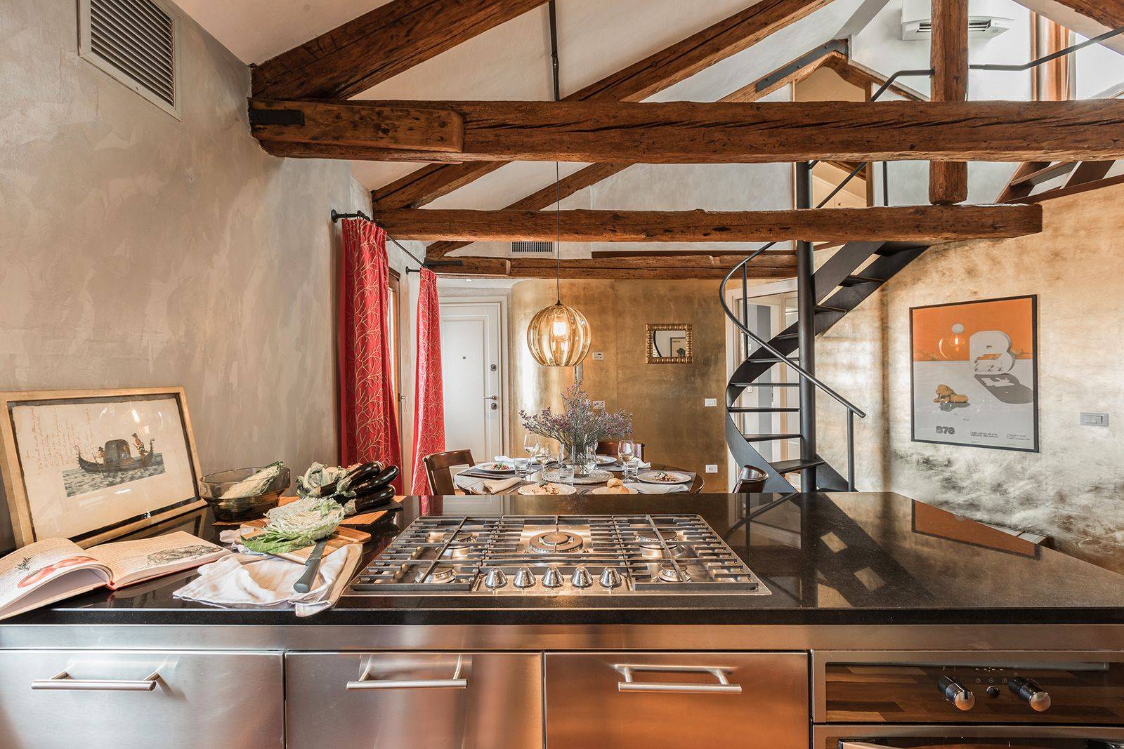 the stylish steel kitchen fits perfectly in the traditional Venetian architecture  the stylish steel kitchen fits perfectly in the traditional Venetian architecture