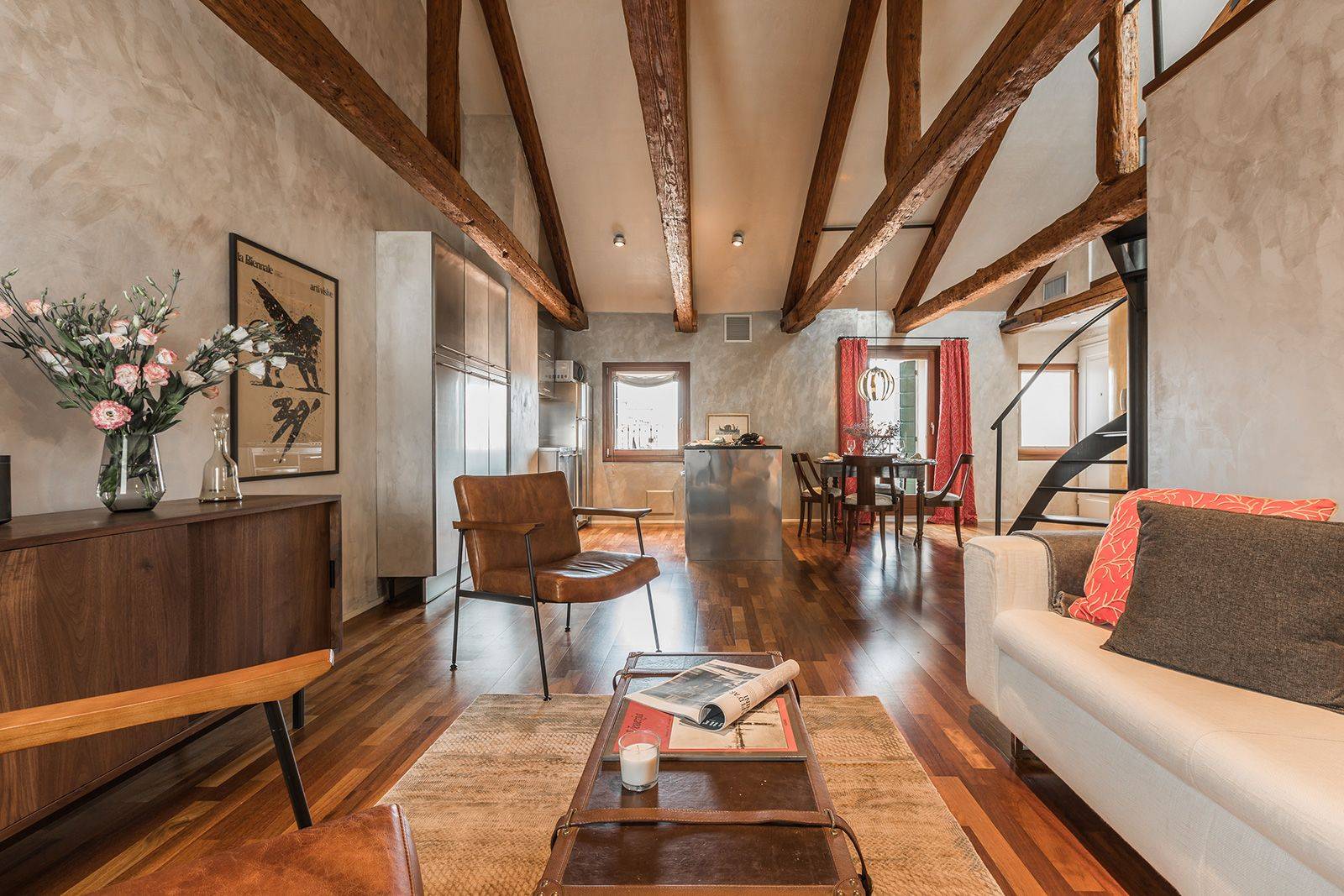 the antique wooden beams and the parquet flooring confer warmth to the ambience the antique wooden beams and the parquet flooring confer warmth to the ambience