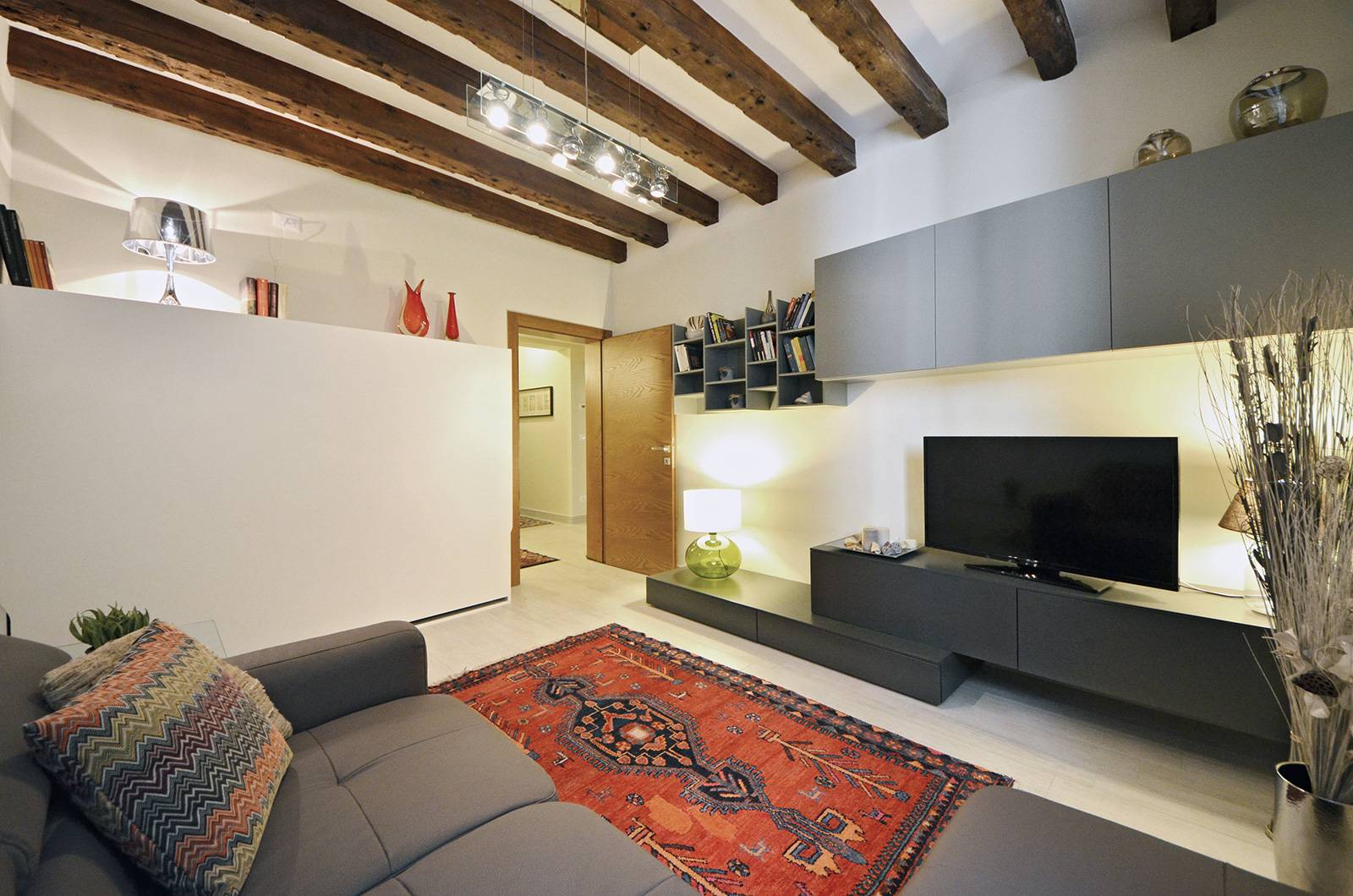 the comfortable living room is connected to the entrance room