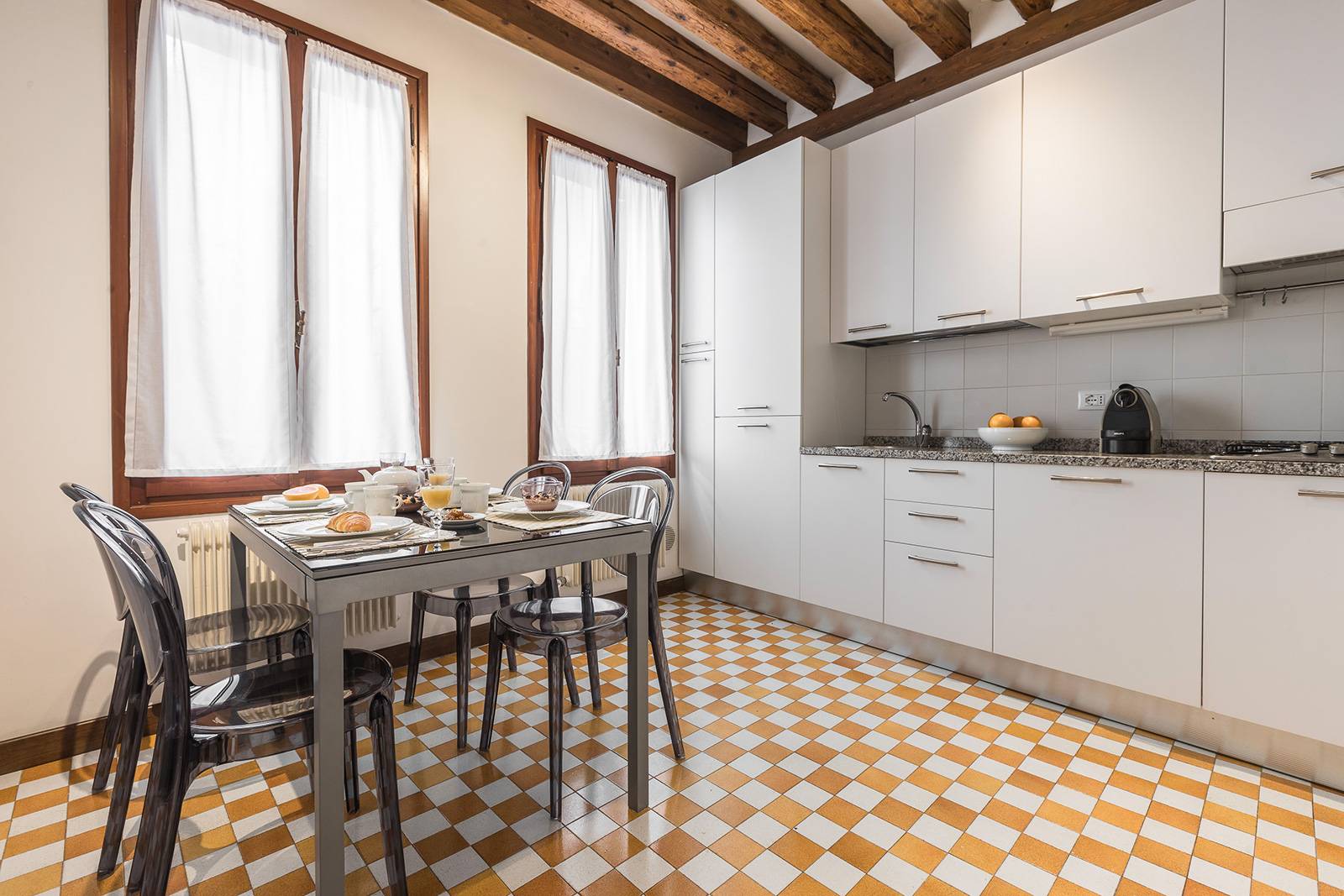 the kitchen is large enough to fit a table for 6 people  the kitchen is large enough to fit a table for 6 people