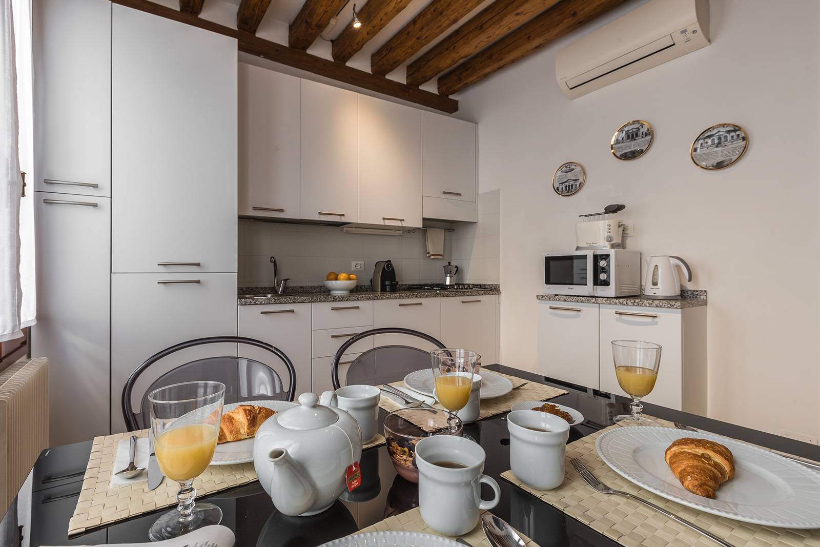 the kitchen is fully equipped and spacious the kitchen is fully equipped and spacious