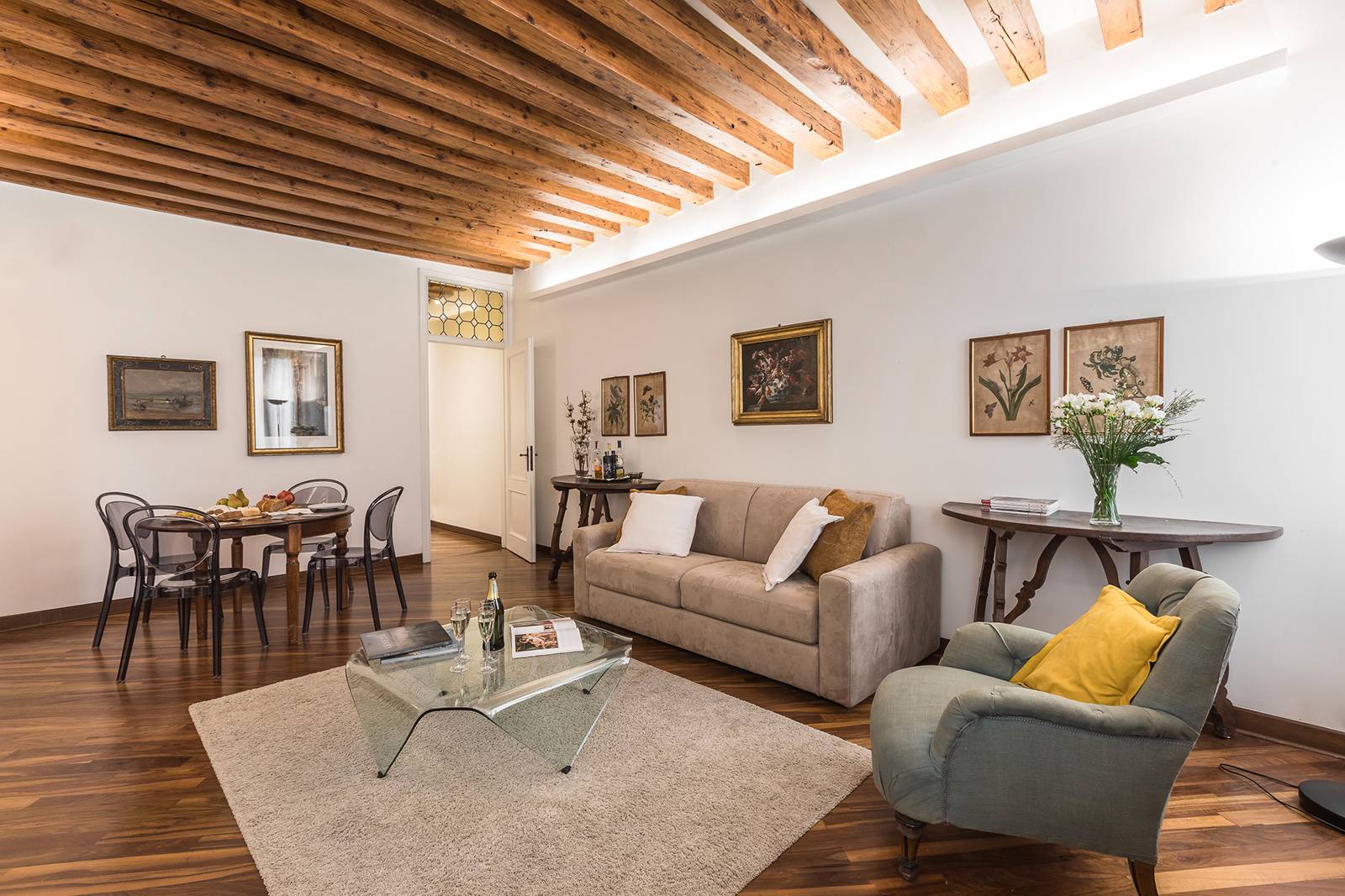 there is a brand new double sofa-bed and an antique wooden round table there is a brand new double sofa-bed and an antique wooden round table