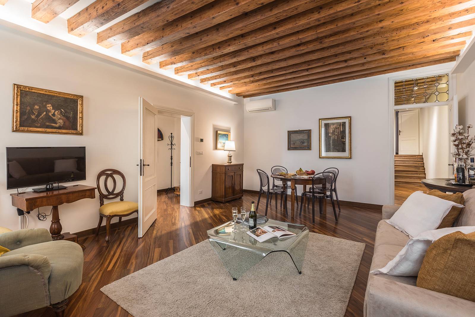 a smart lighting system highlights the beams and confers an easy living sort of ambience a smart lighting system highlights the beams and confers an easy living sort of ambience