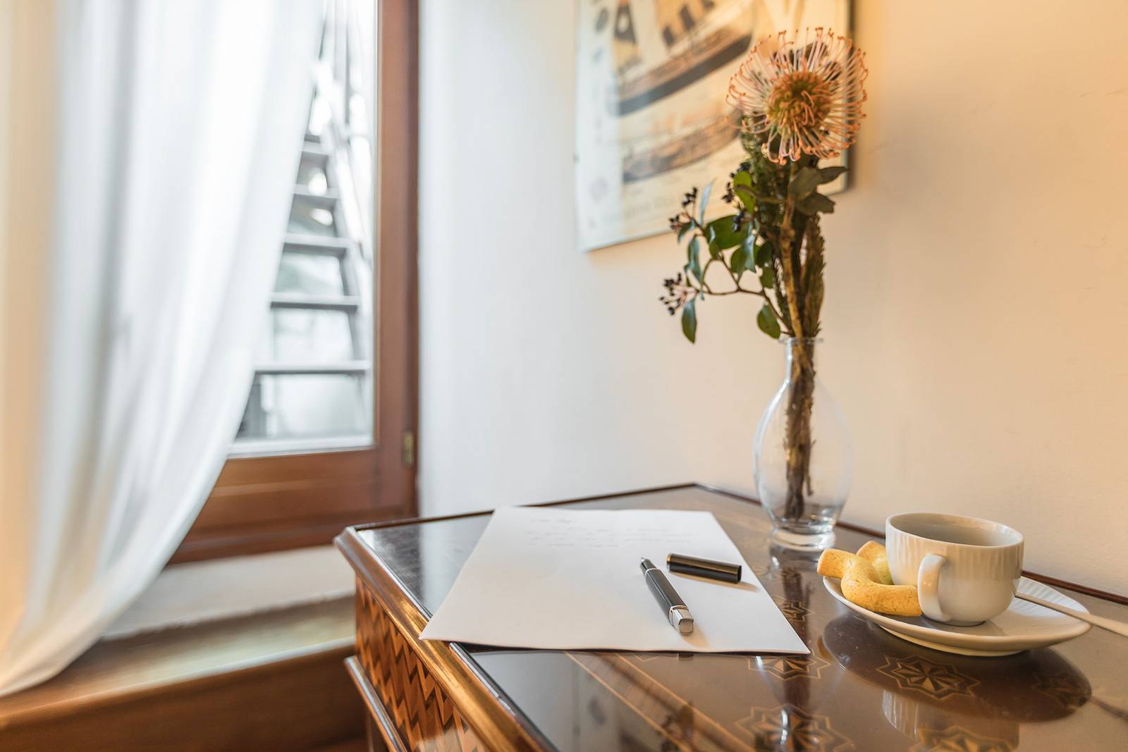 there is also an antique desk next to the access to the roof-top terrace there is also an antique desk next to the access to the roof-top terrace