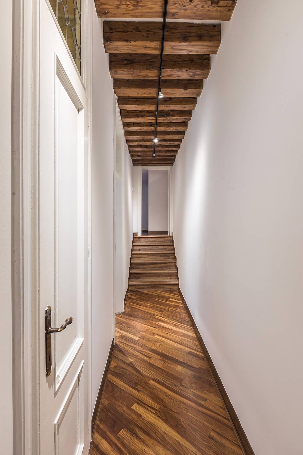 a nice corridor connects the living room with the bedrooms a nice corridor connects the living room with the bedrooms