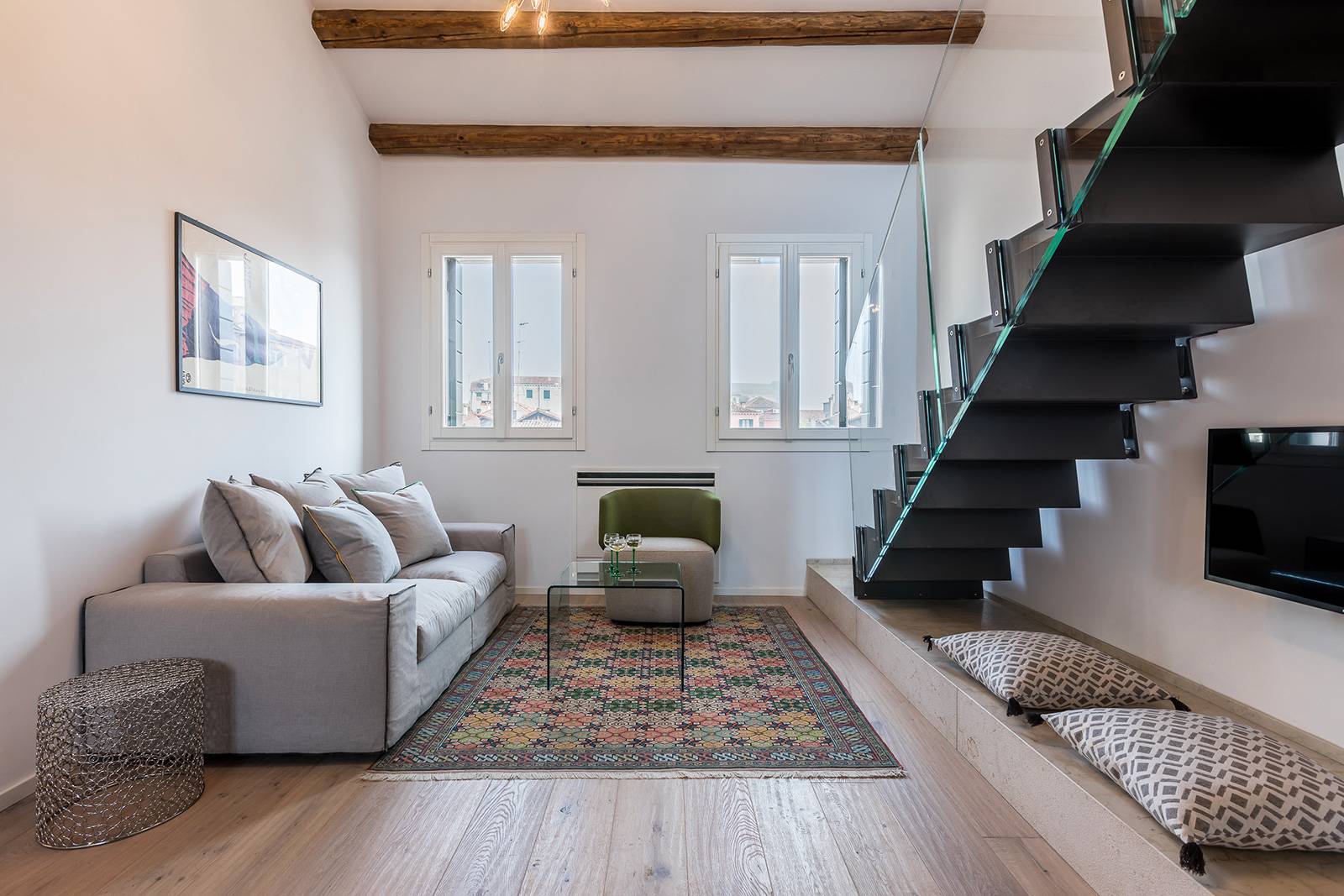 the cozy living room offers a spectacular view over Church, Campo and Squero di San Trovaso!