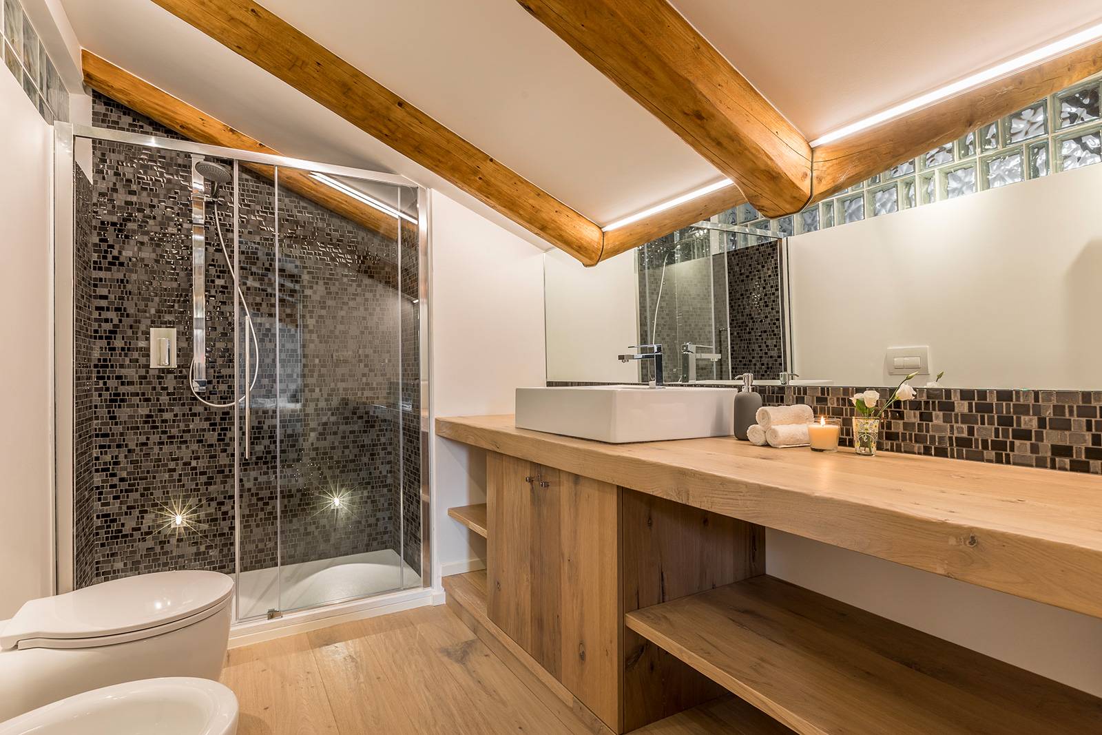 the luxury en-suite bathroom with nice mosaic tiled shower is a real treat