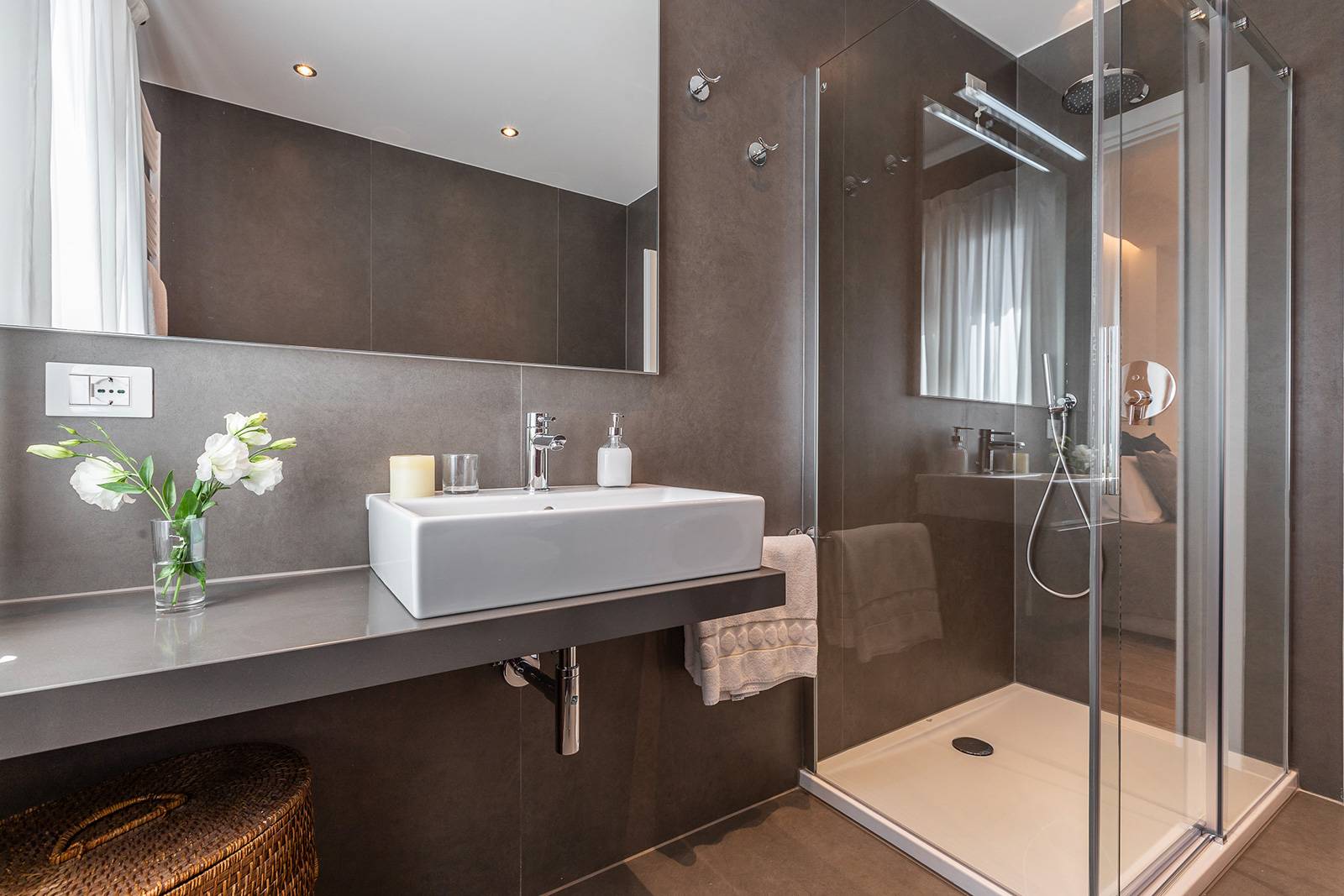 luxury en-suite bathroom with large shower cabin