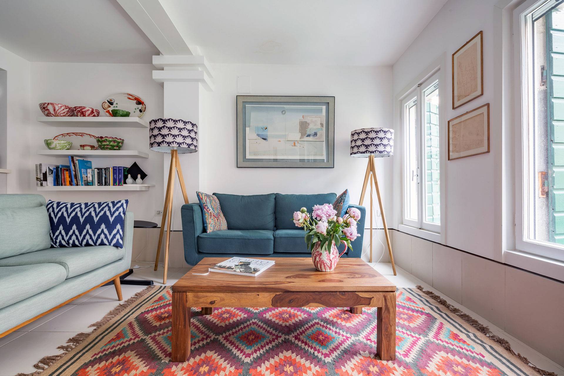 freshly furnished living room with plenty of natural light and canal view freshly furnished living room with plenty of natural light and canal view