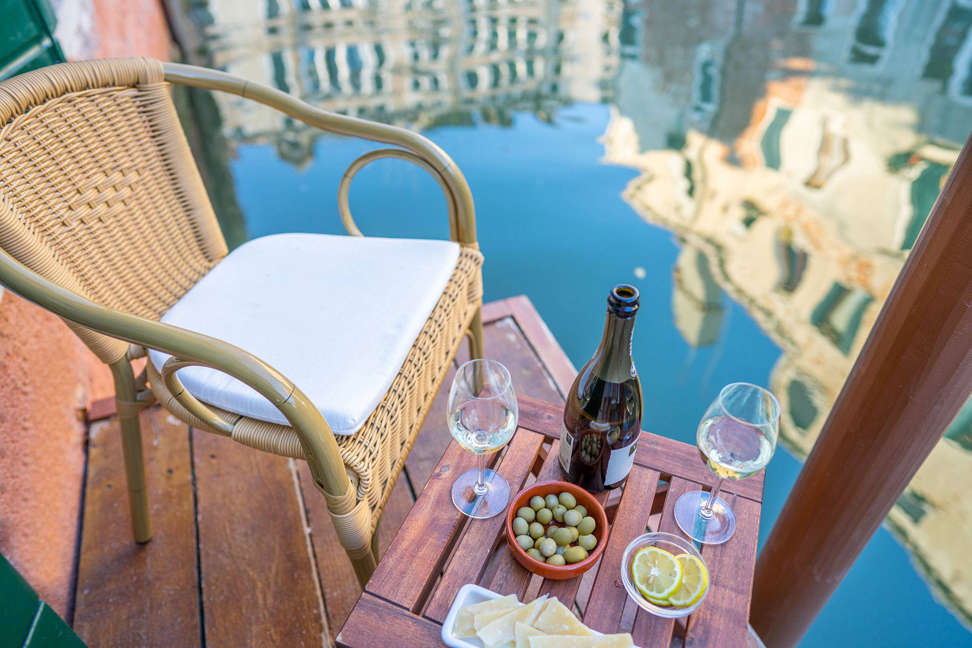 watching reflections of the antique buildings on the water surrounding you watching reflections of the antique buildings on the water surrounding you