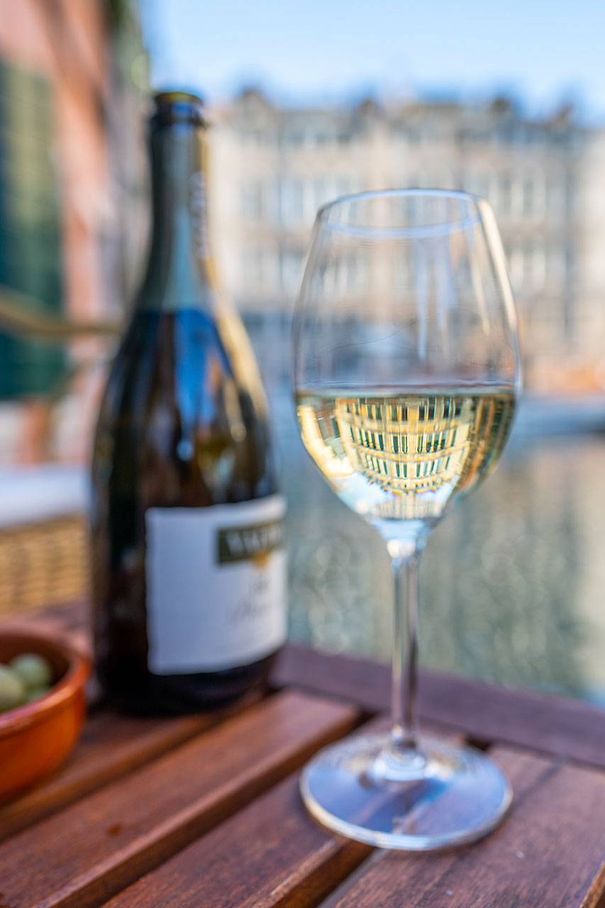 enjoying a good bottle of Italian wine with your loved one enjoying a good bottle of Italian wine with your loved one