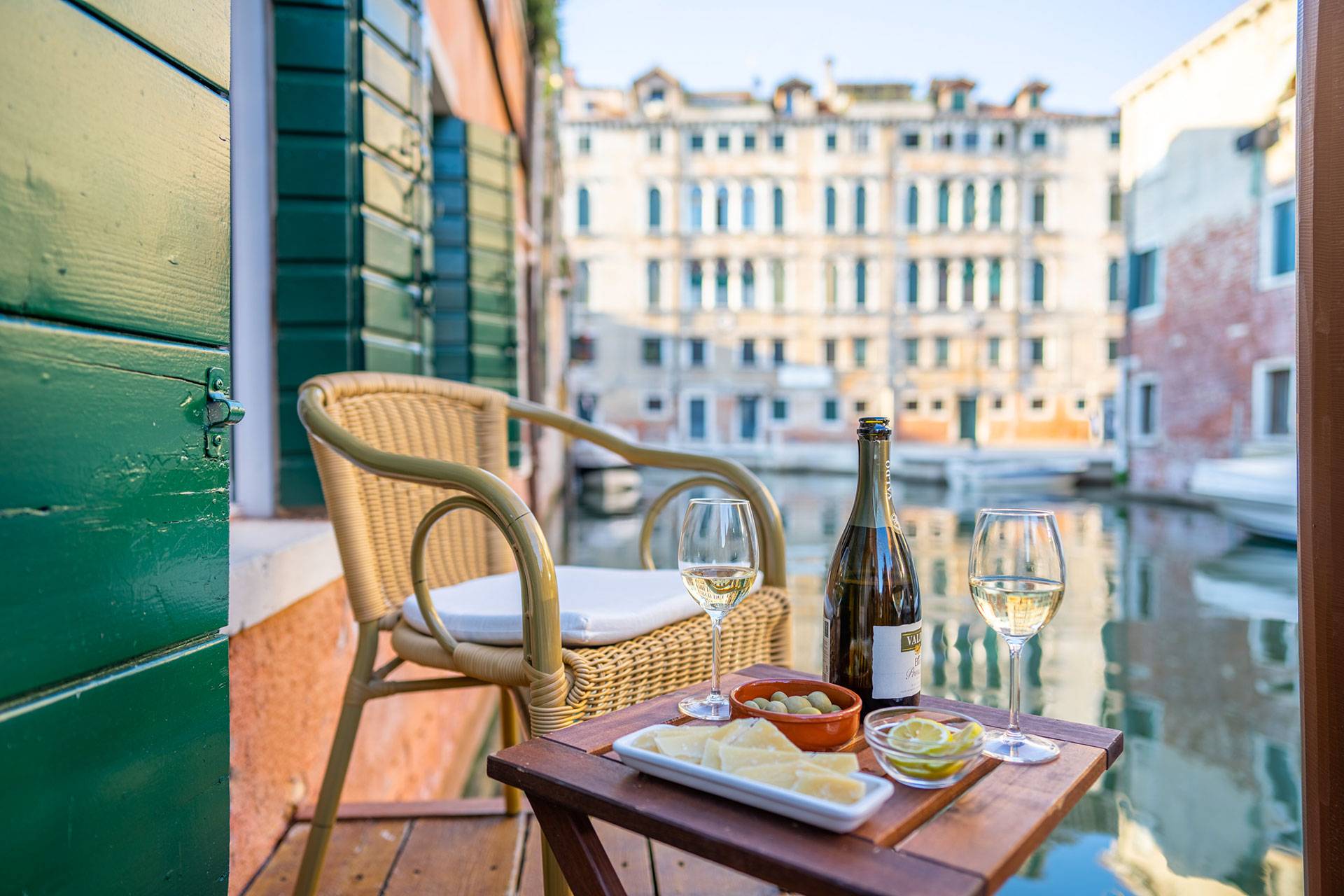 romantic canal view aperitives on the terrace at sunset romantic canal view aperitives on the terrace at sunset