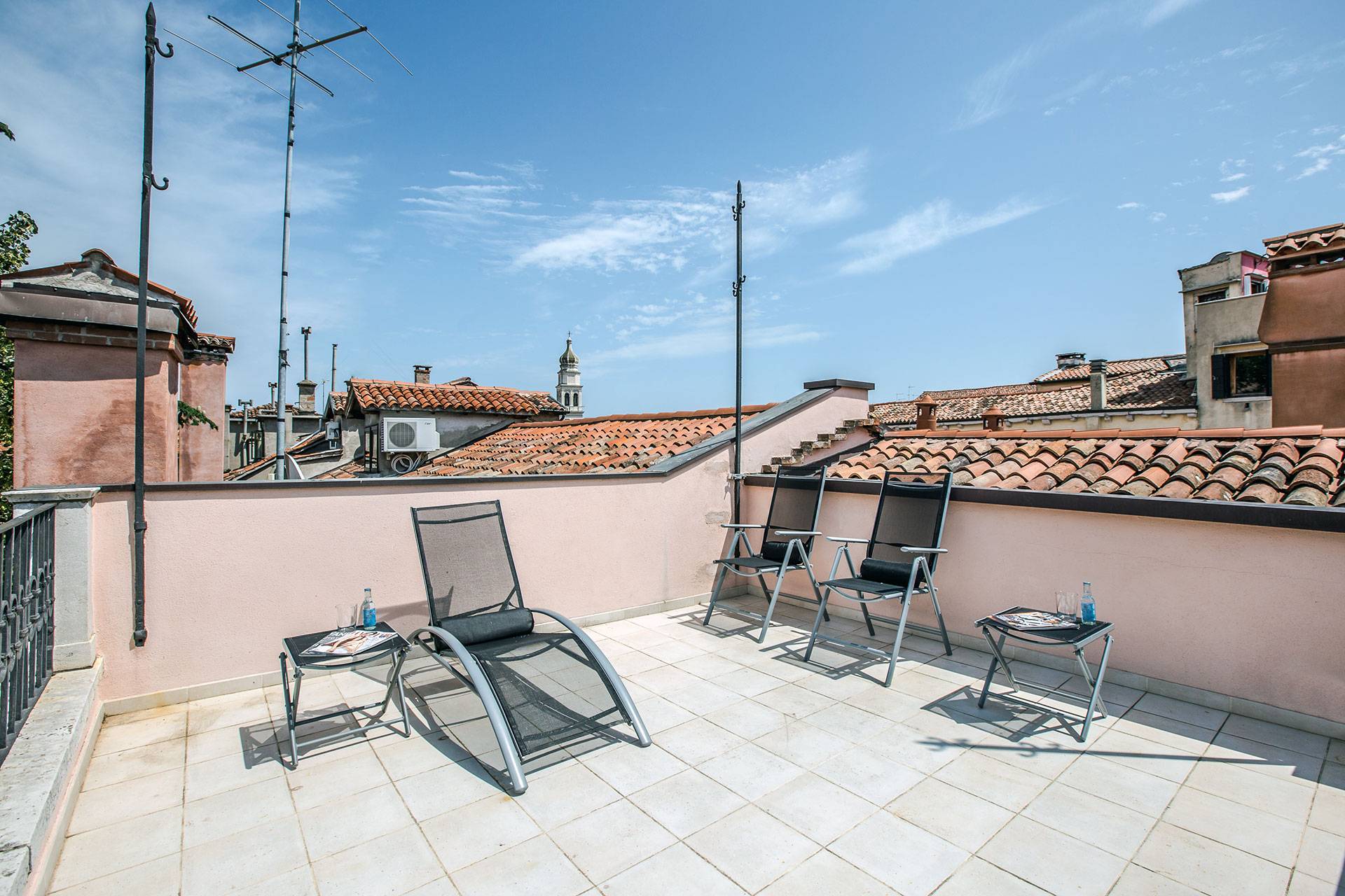 relax in the sun at the Alighieri Palace!