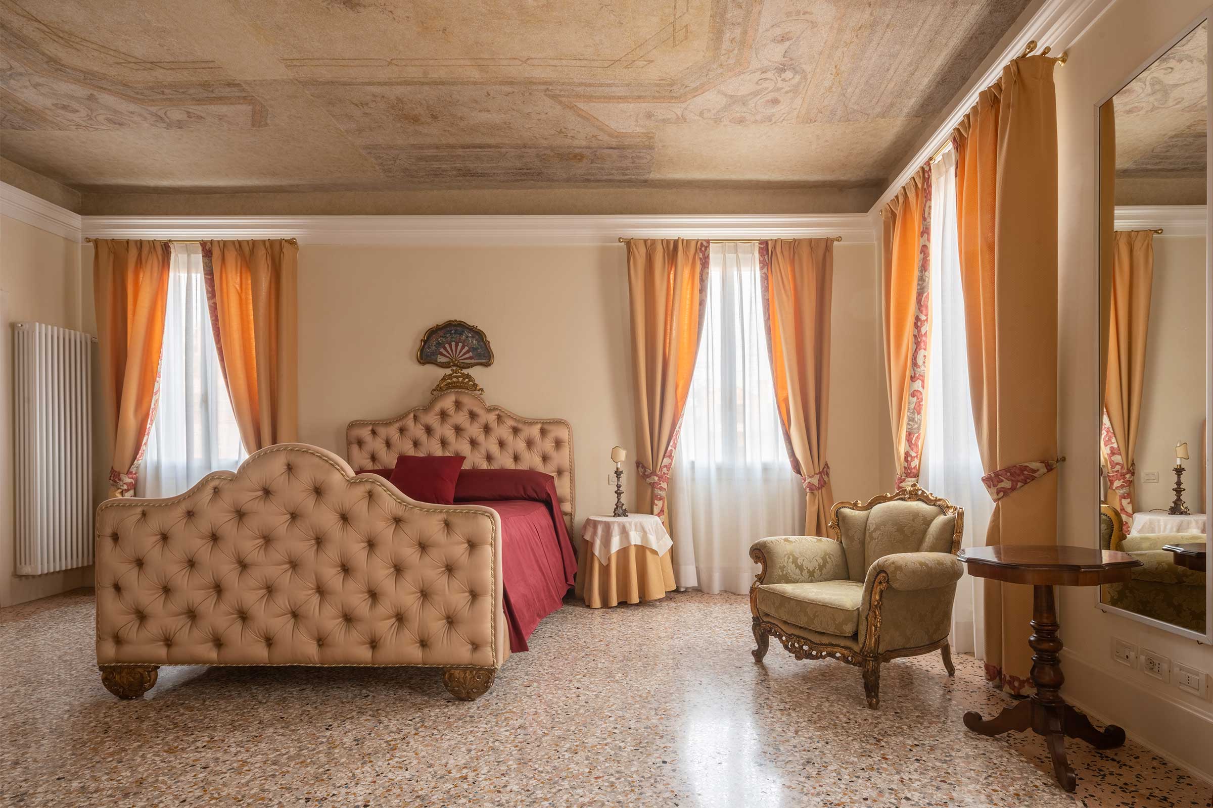 frescoed ceilings, Seminato Veneziano flooring and refined textiles
