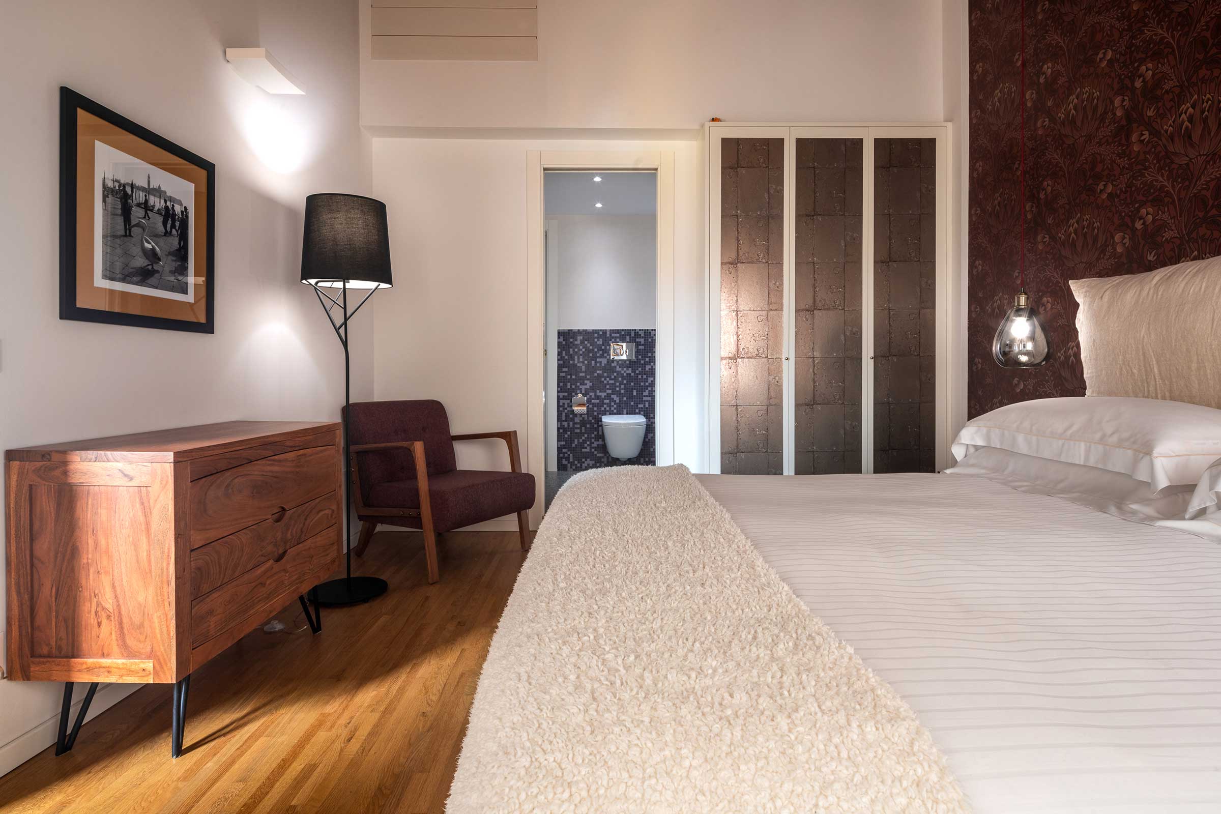 bedroom 1, with canal view and en-suite bathroom