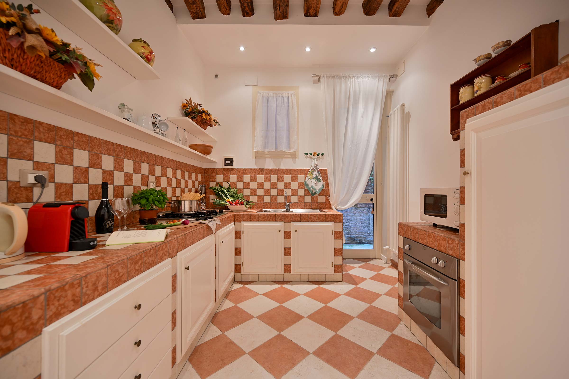 the private courtyard is accessible from the kitchen 