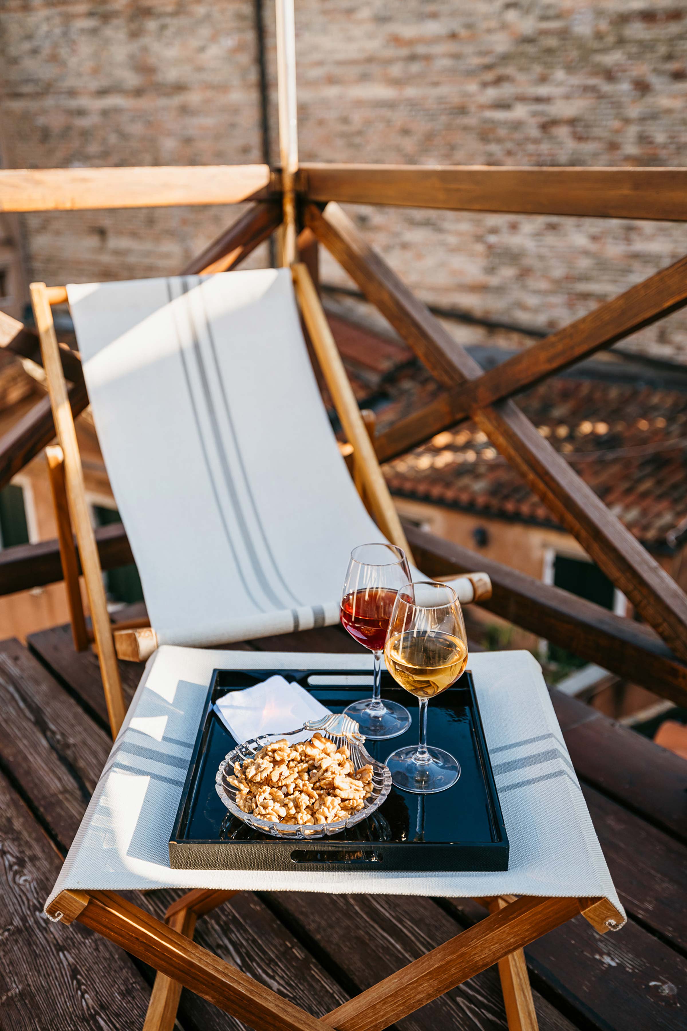 relax and enjoy an aperitive at sunset on the rooftops