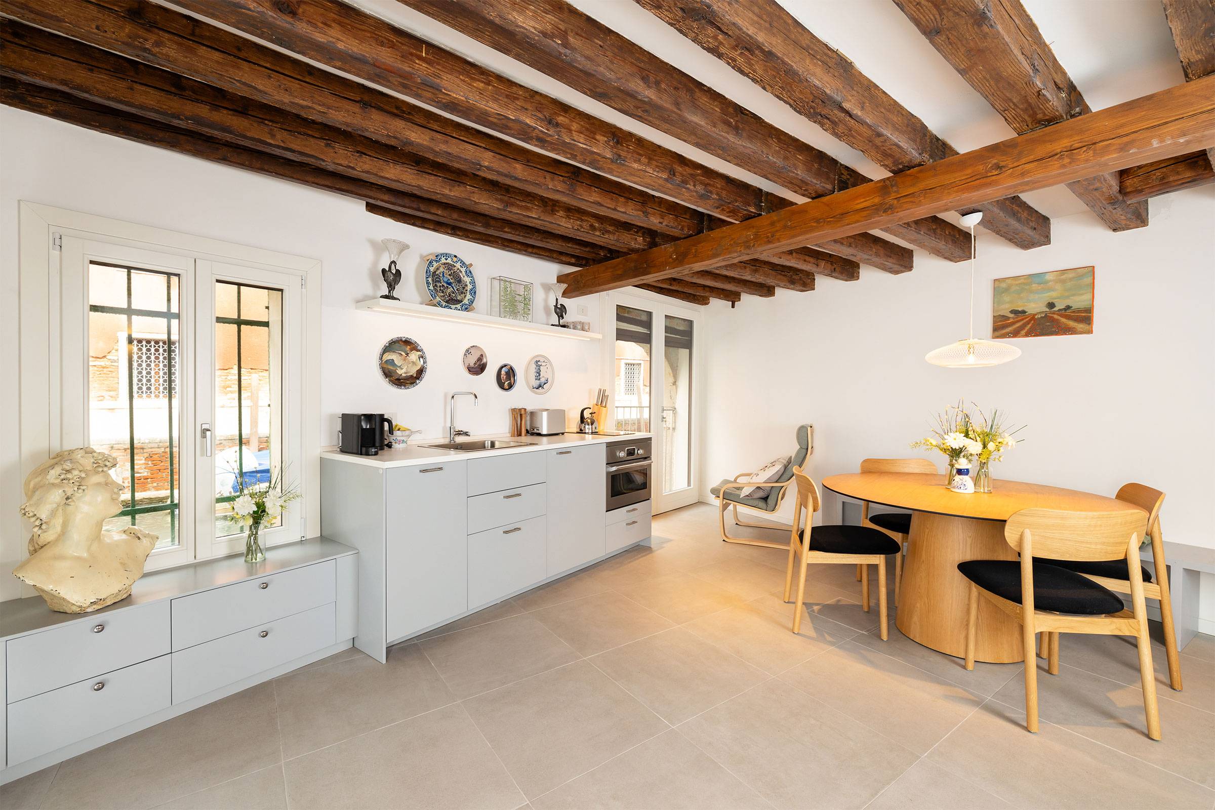 spacious and functional living room with antique wooden beams spacious and functional living room with antique wooden beams