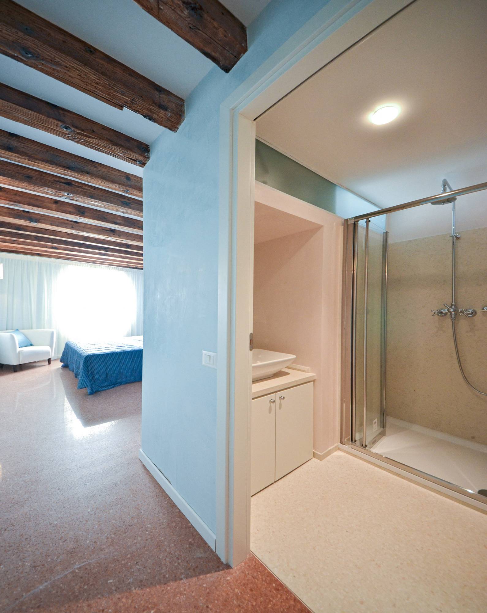 sunny master bedroom with en-suite bathroom