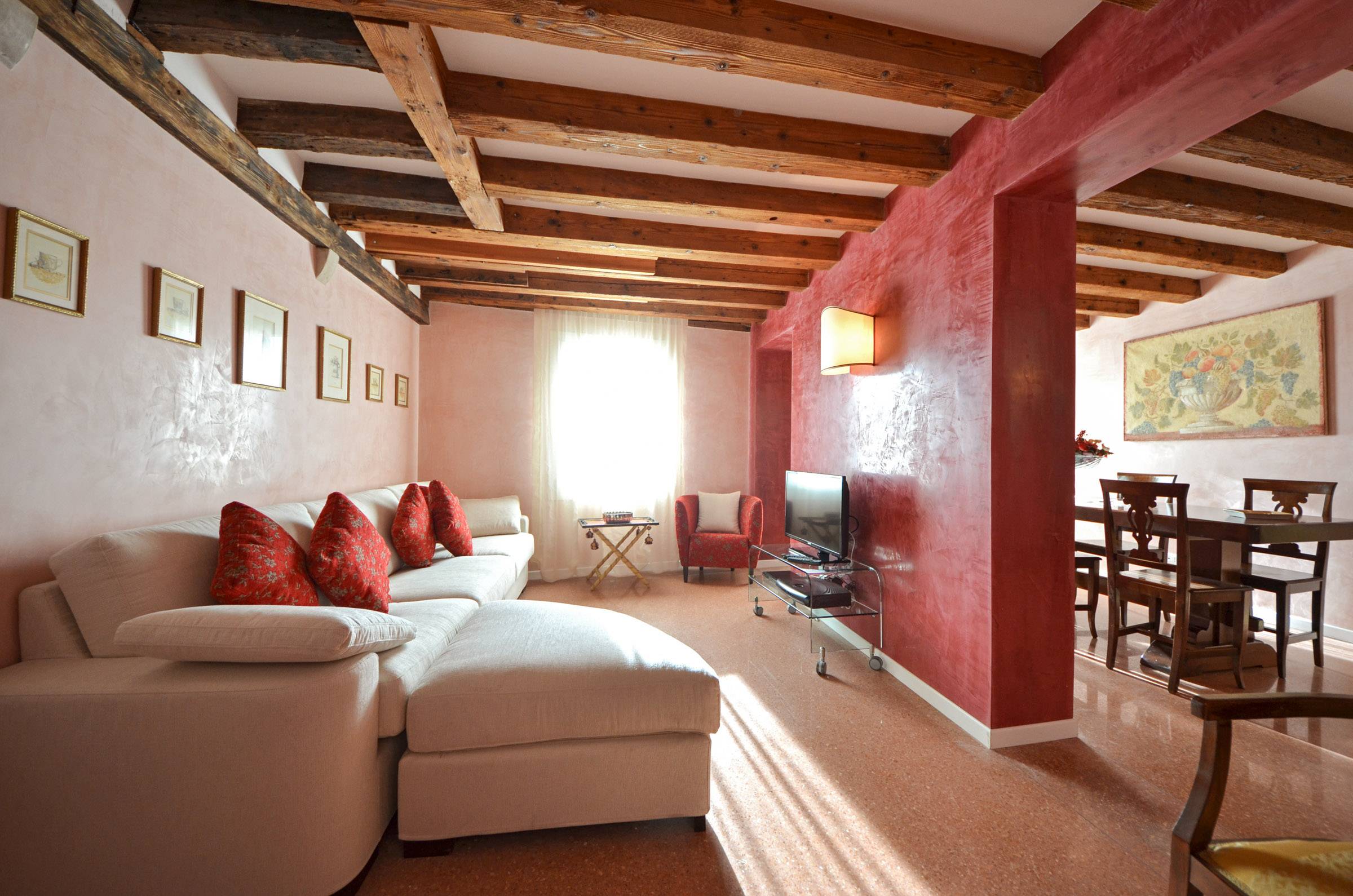 sunny living room facing Fondamenta delle Zattere and the Giudecca Canal