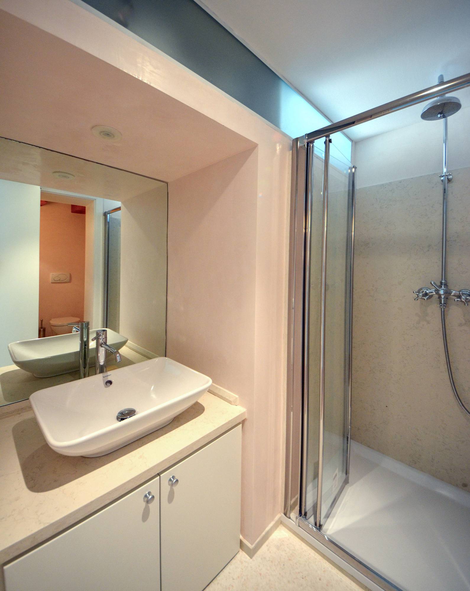 sunny master bedroom with en-suite bathroom