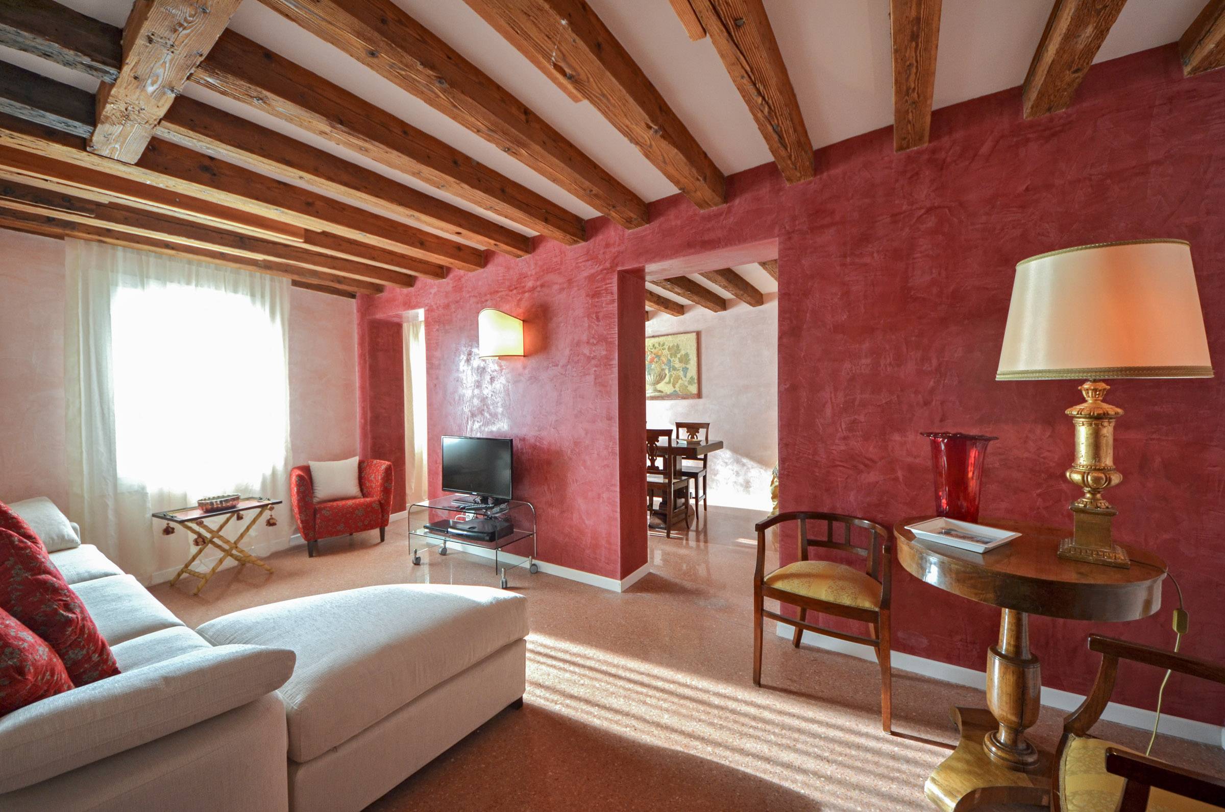 sunny living room facing Fondamenta delle Zattere and the Giudecca Canal