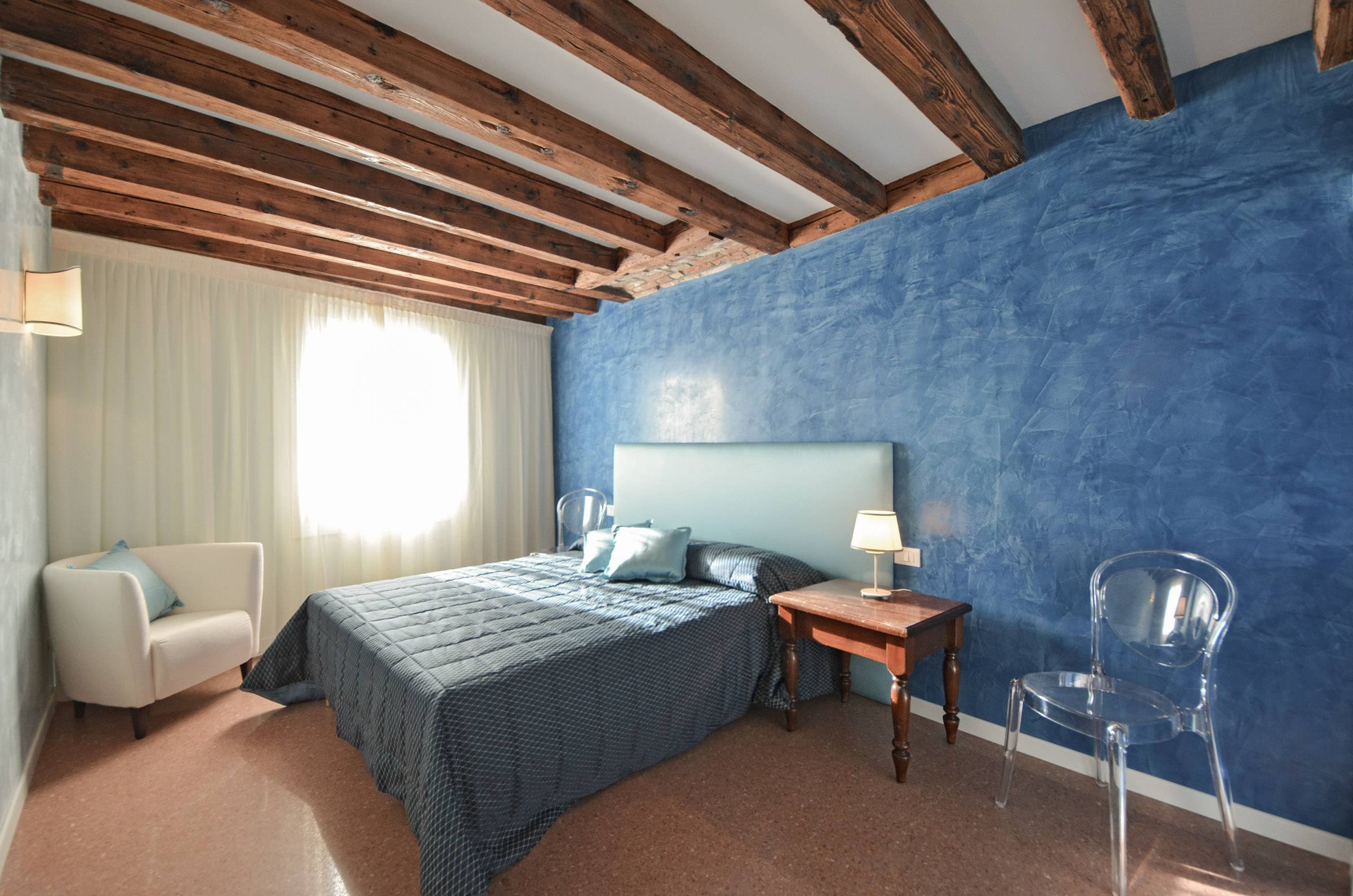 sunny master bedroom with en-suite bathroom